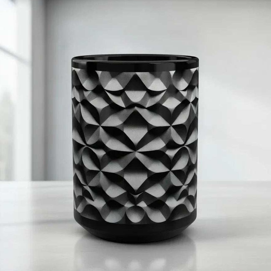Black geometric textured mug with embossed 3D pattern, rounded cylindrical shape