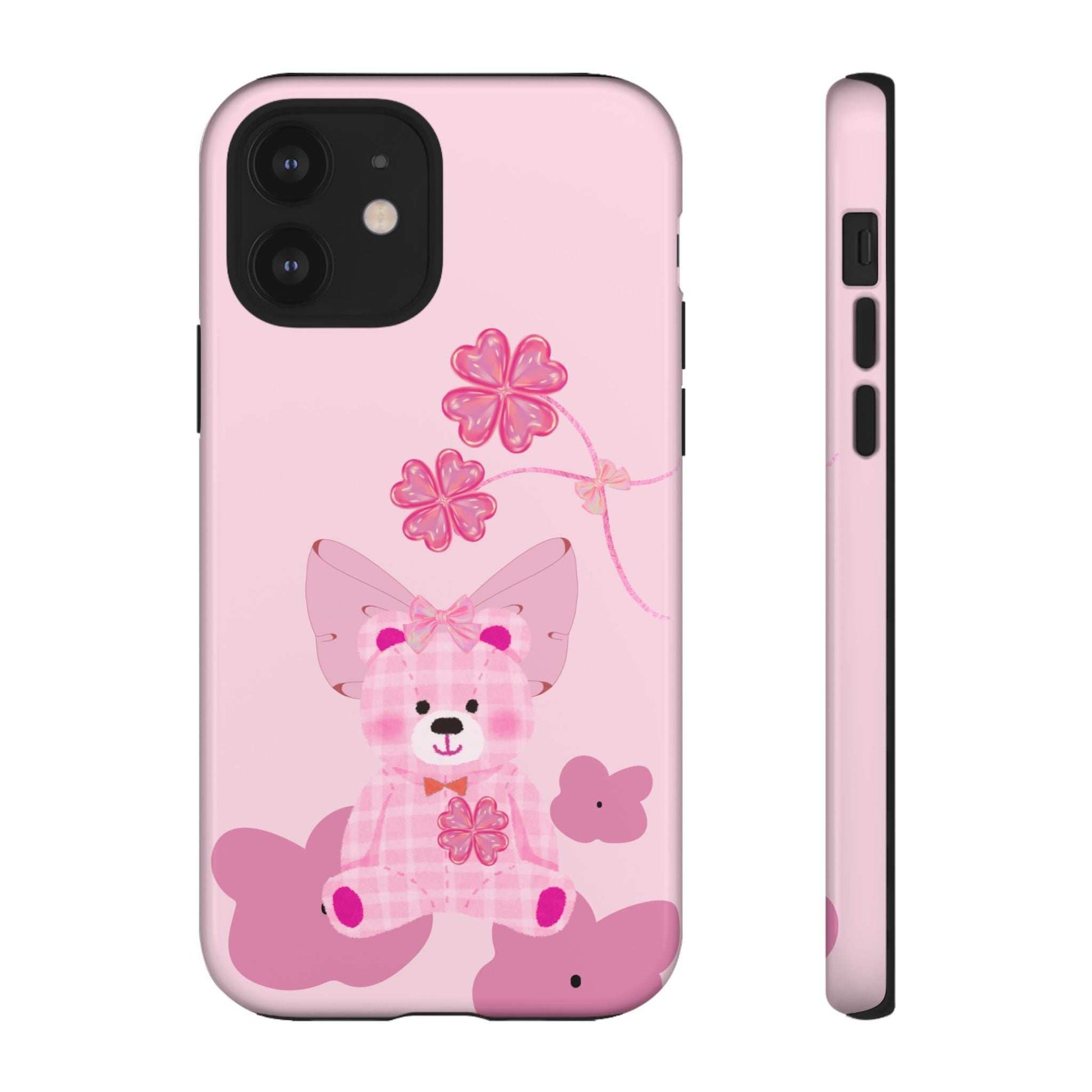 Pink phone case featuring teddy bear with bow; camera cutout and side profile.