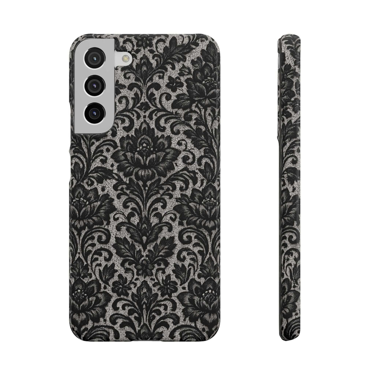 Black damask floral phone case with camera cutouts and raised edges for protection