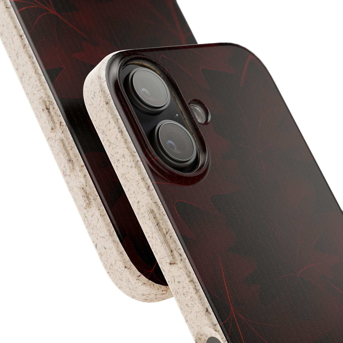 Close-up of burgundy phone case with leaf pattern and dual camera cutouts