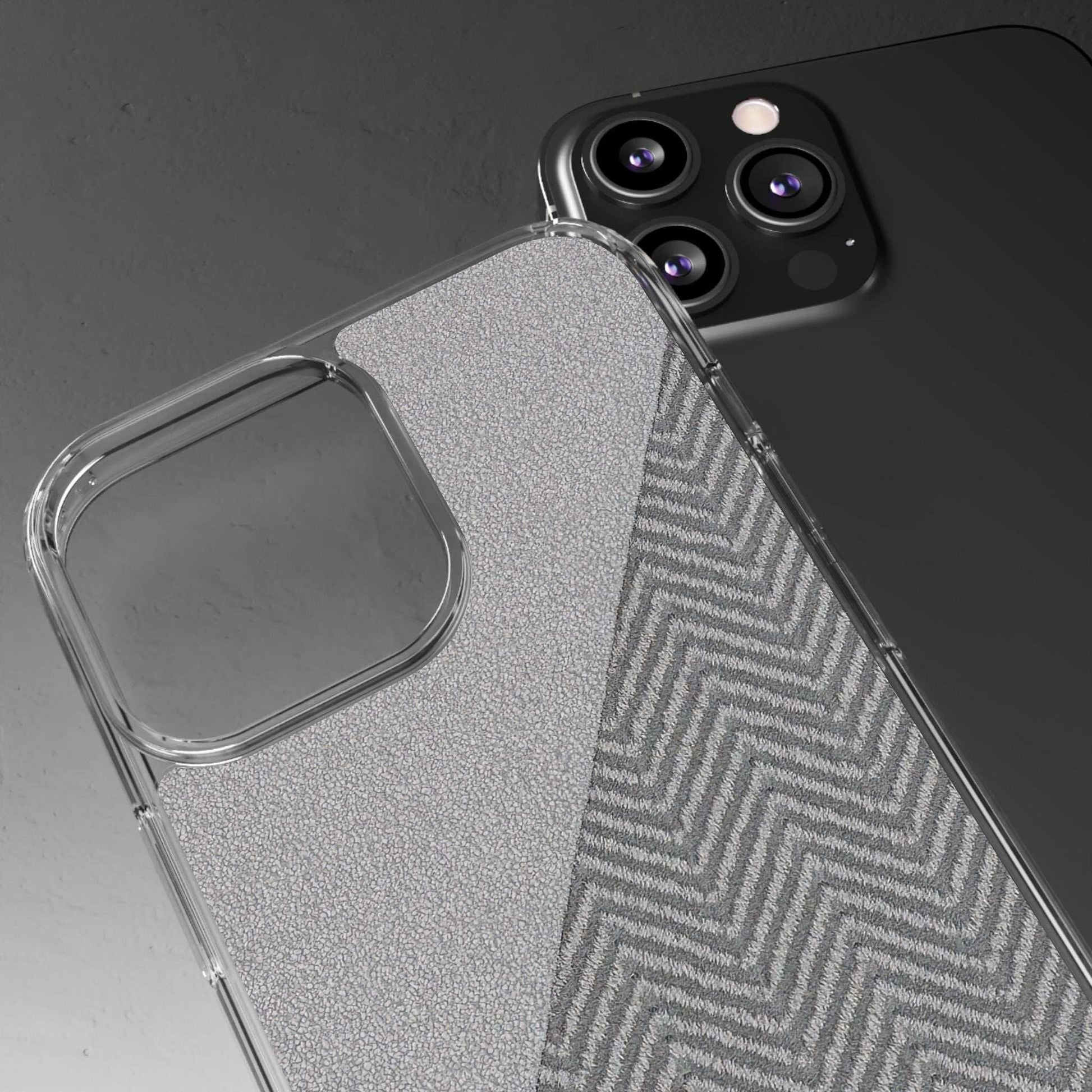 Clear tough phone case with dark herringbone side panel and camera protection