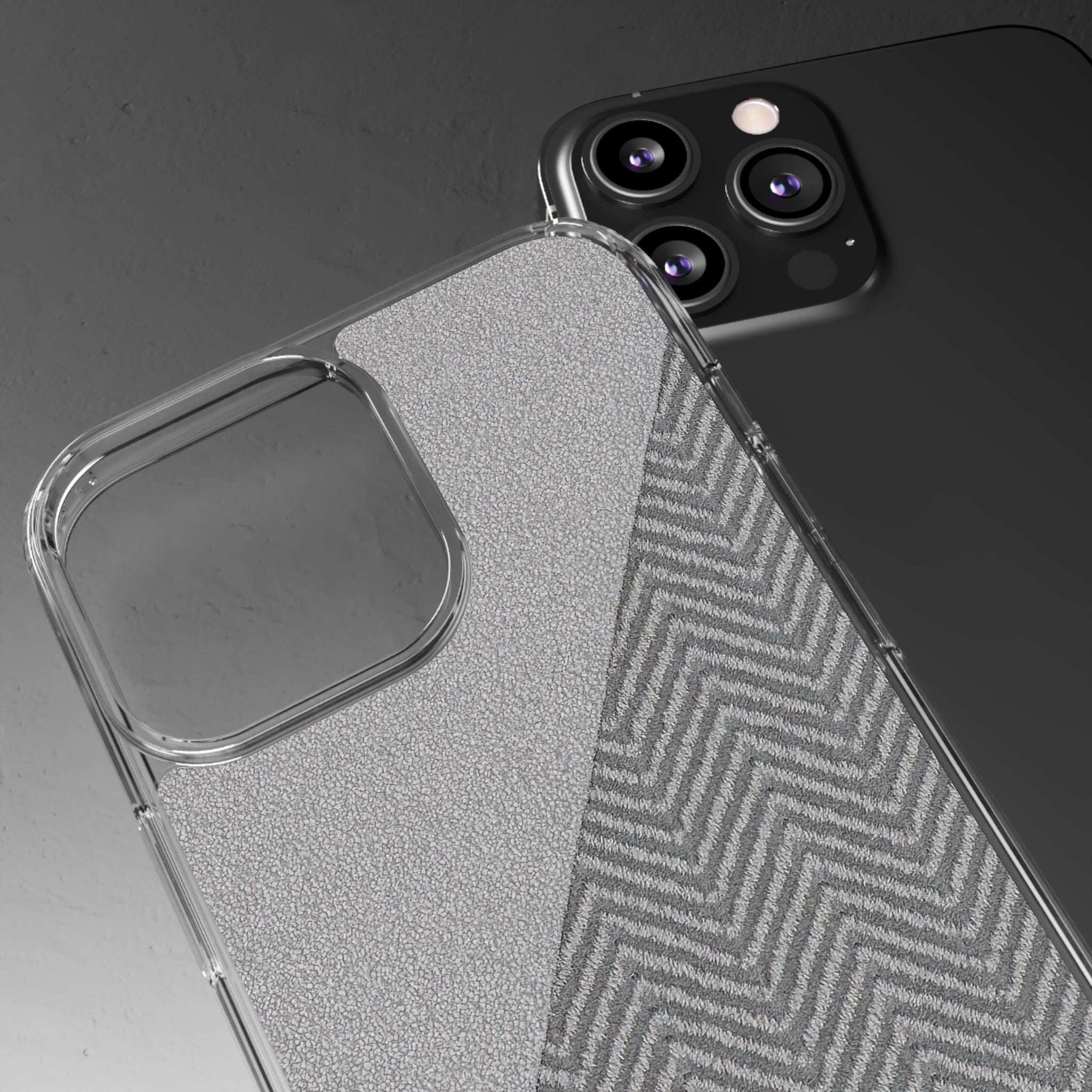 Clear tough phone case with dark herringbone side panel and camera protection