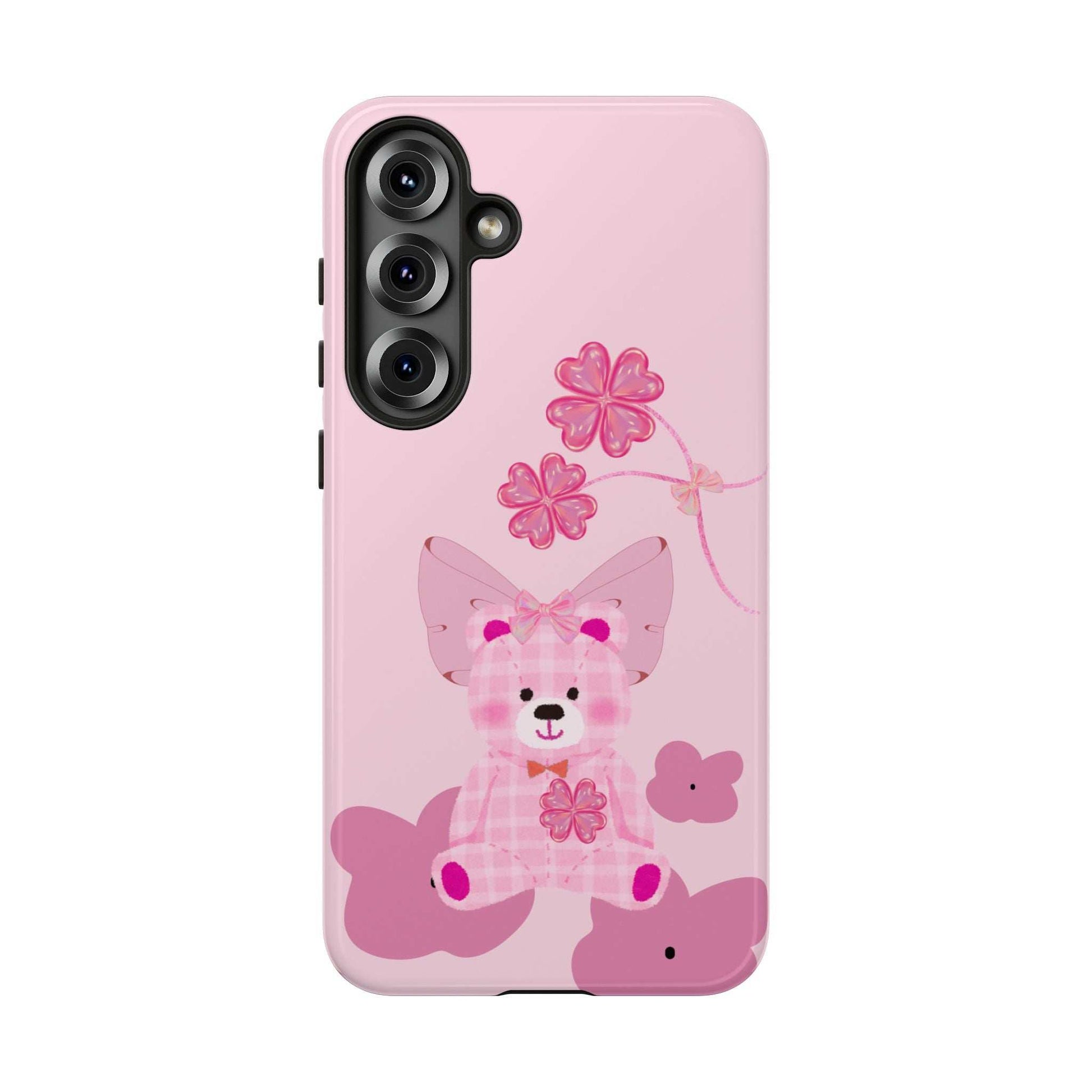 Pink phone case with teddy bear illustration and blossoms, camera module cutouts visible.