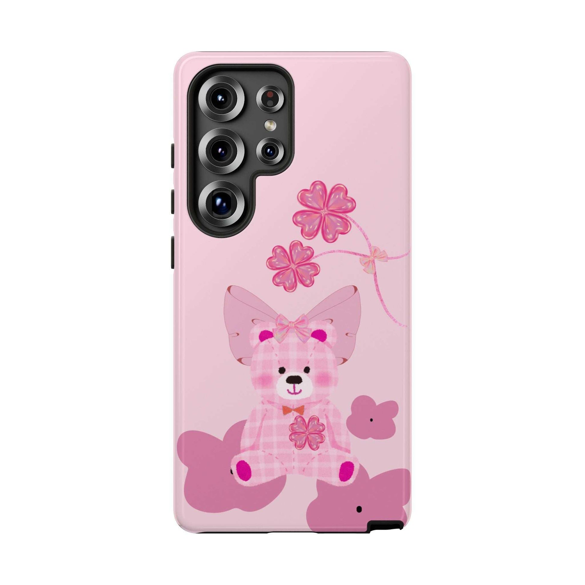 Pink phone case with teddy bear graphic and floral details; camera lenses visible