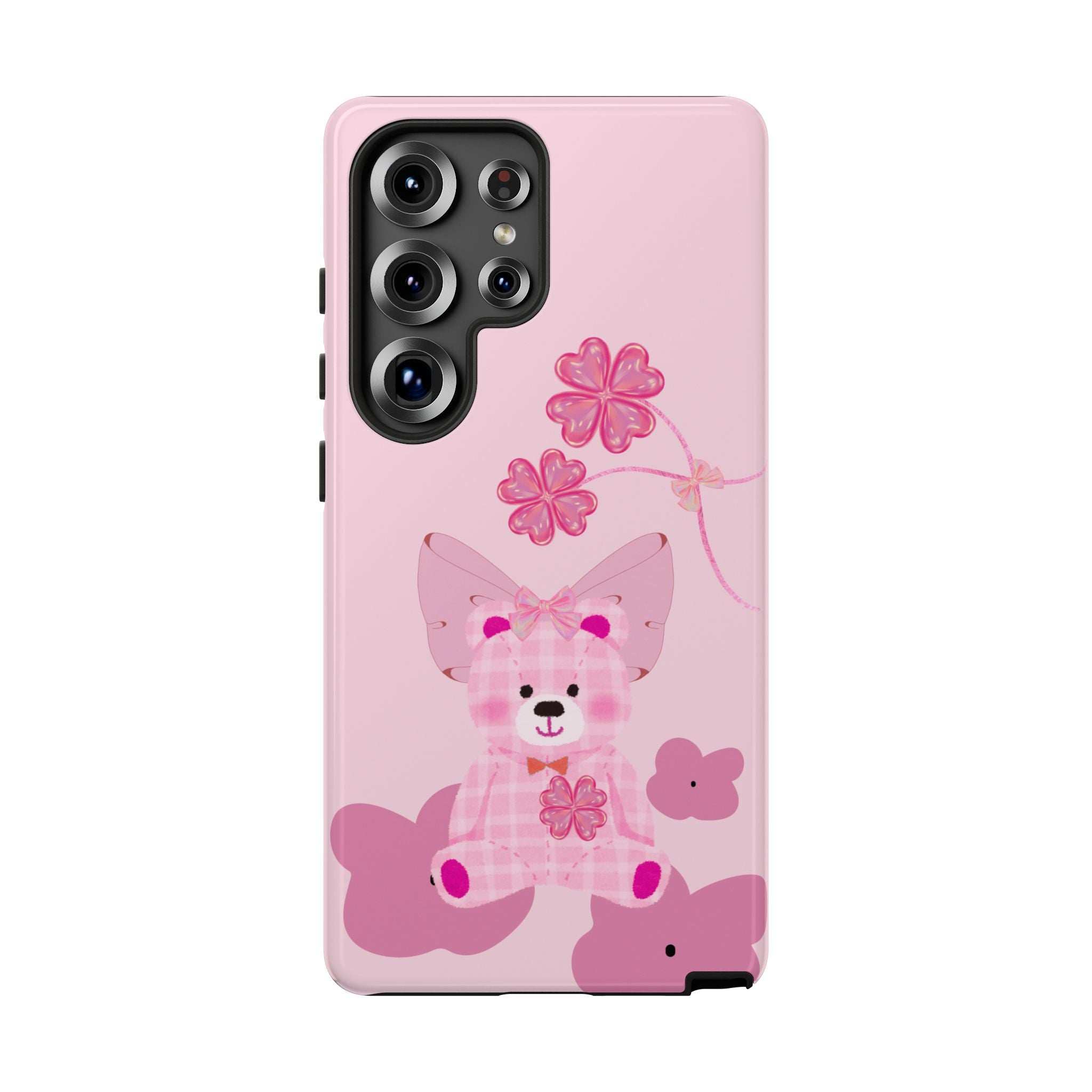 Pink phone case with teddy bear graphic and floral details; camera lenses visible