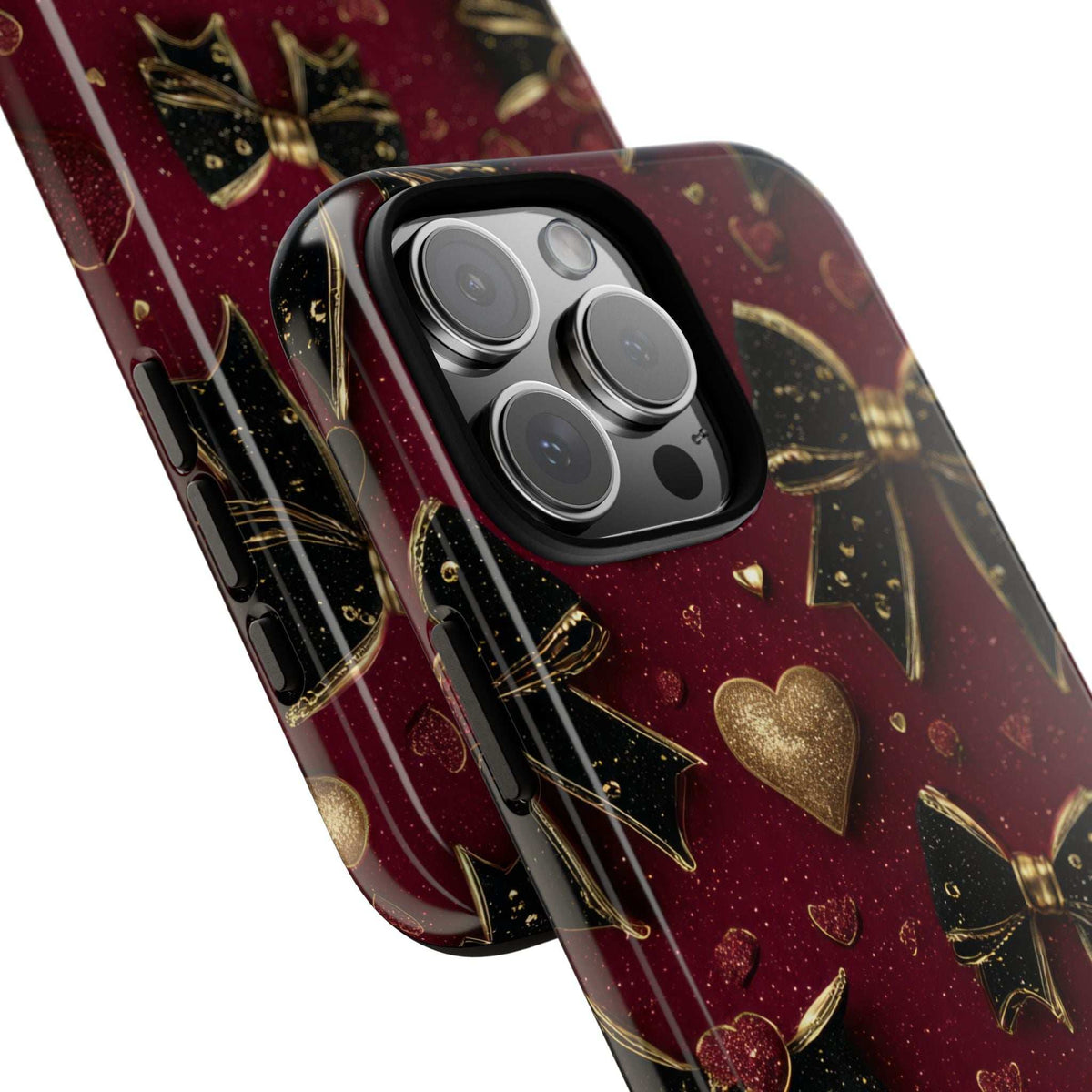 Glossy burgundy charm phone case with gold hearts and keys, raised camera cutouts