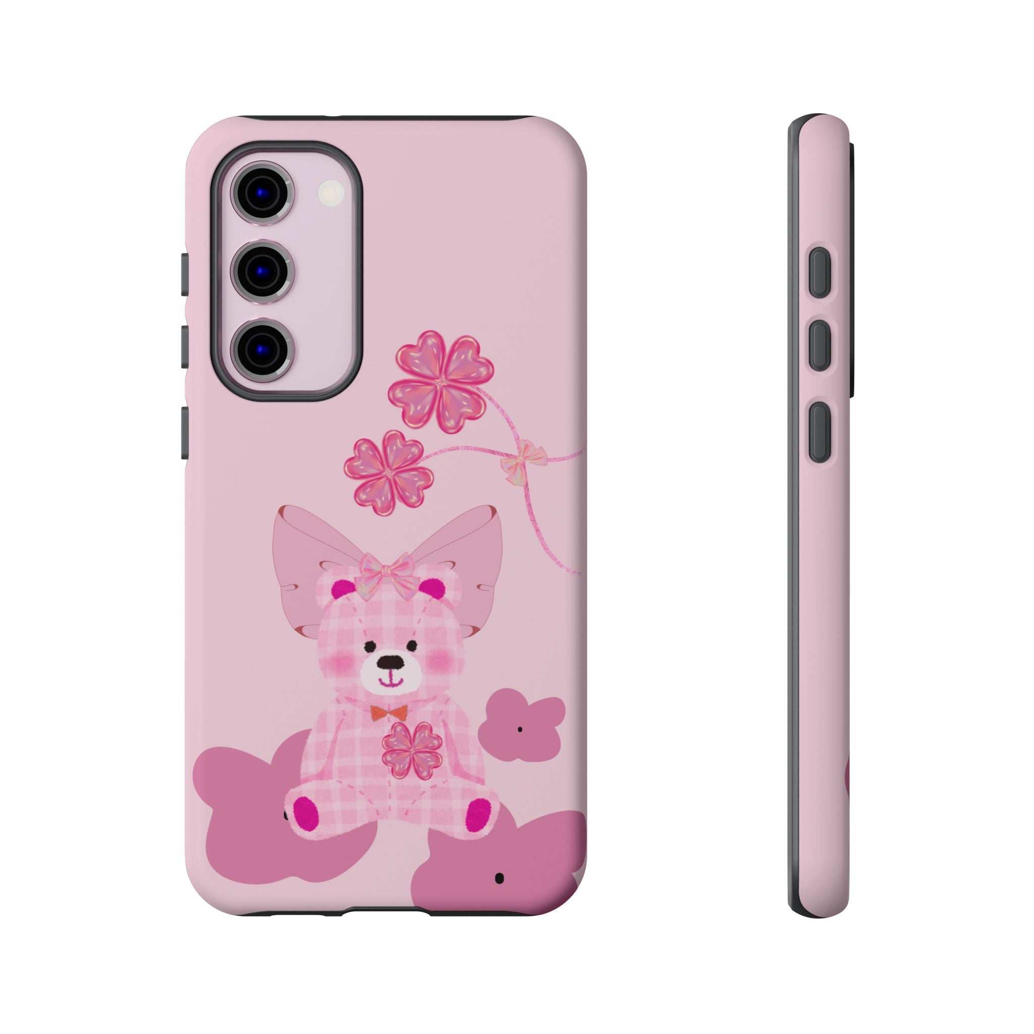 Pink phone case with teddy bear and flowers; camera cutout and side profile visible.