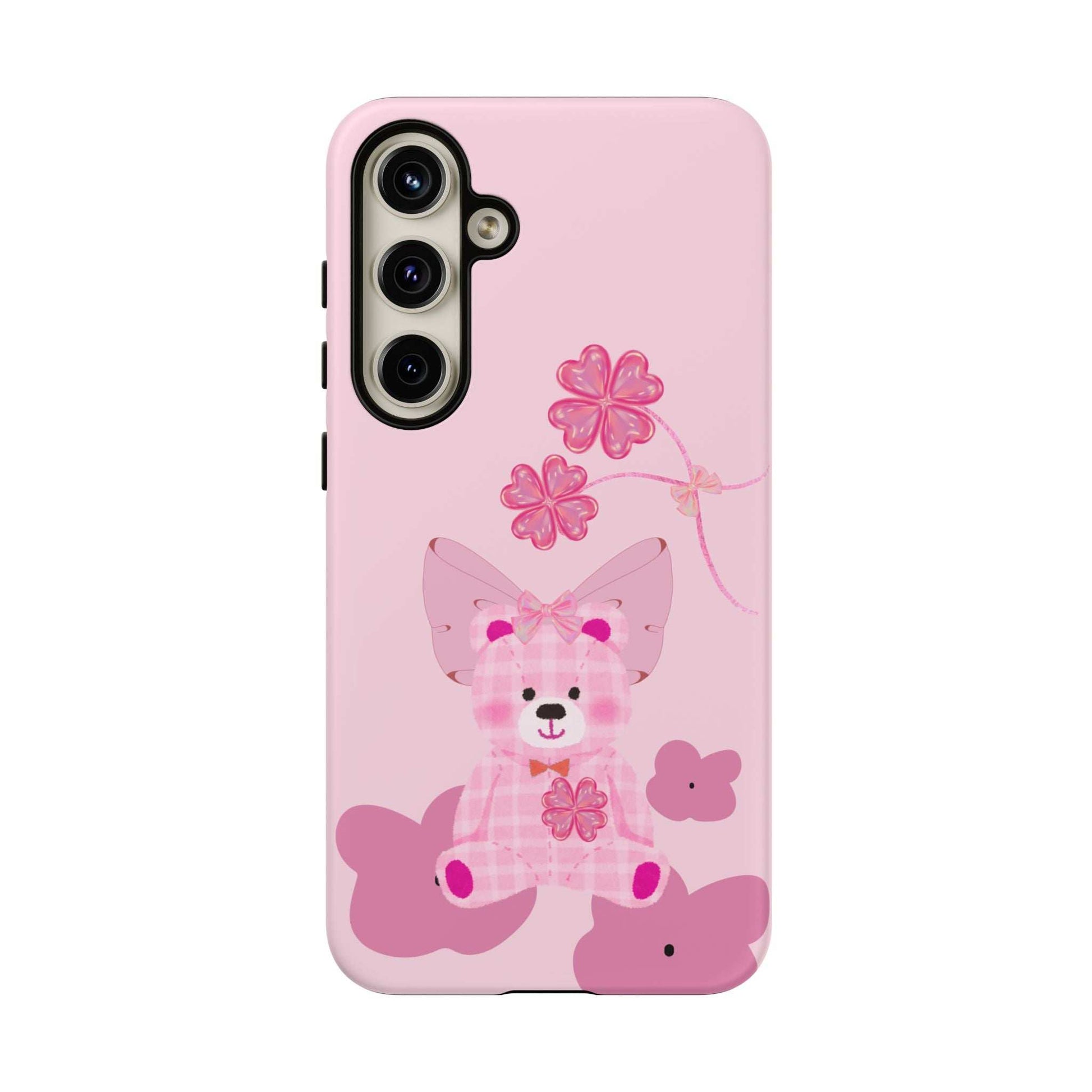 Pink phone case with teddy bear and flower accents; back plus side profile.