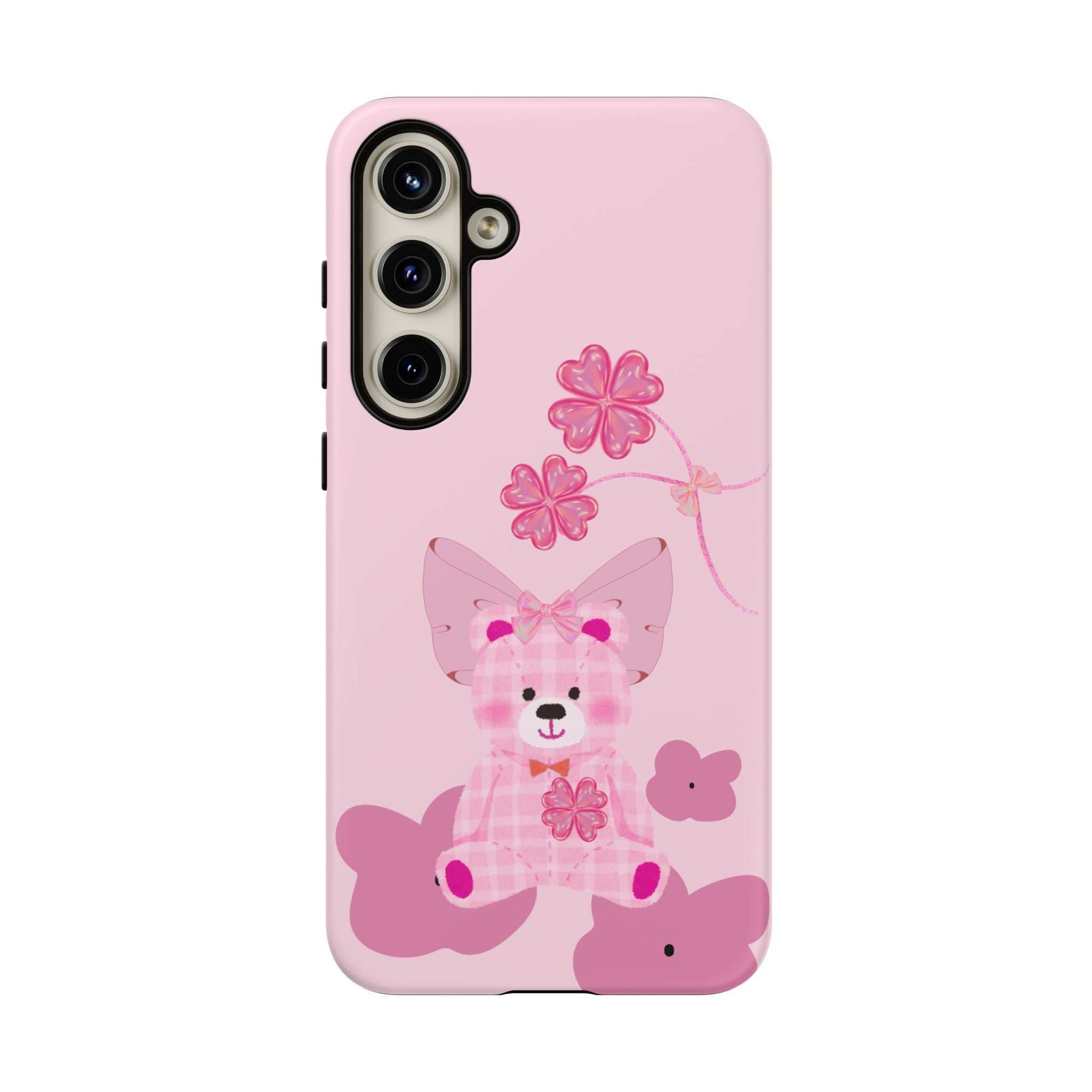 Pink phone case with teddy bear and flower accents; back plus side profile.