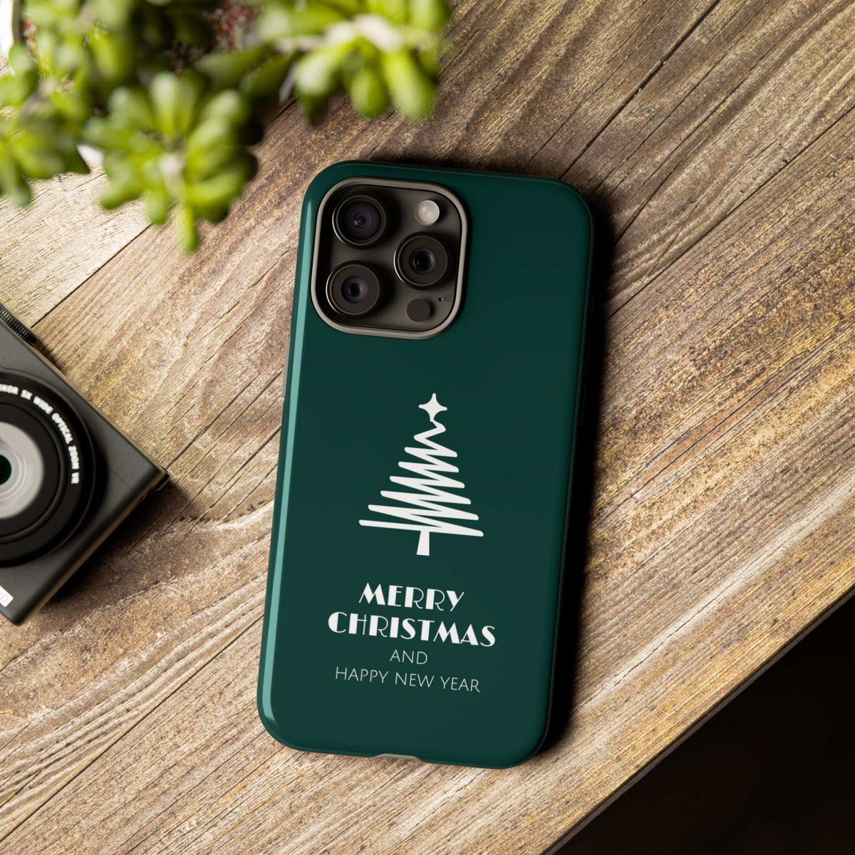 Teal glossy phone case with white Christmas tree and Merry Christmas Happy New Year