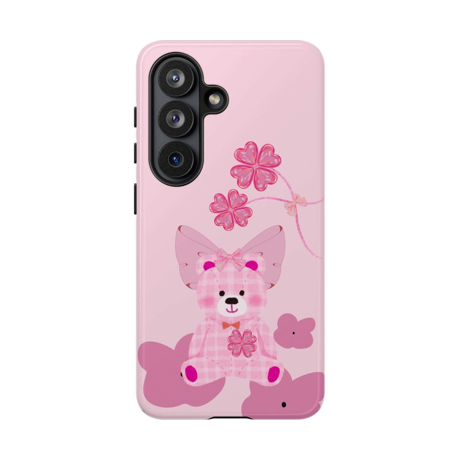 Light pink teddy bear phone case with bow and flower artwork, vertical triple camera