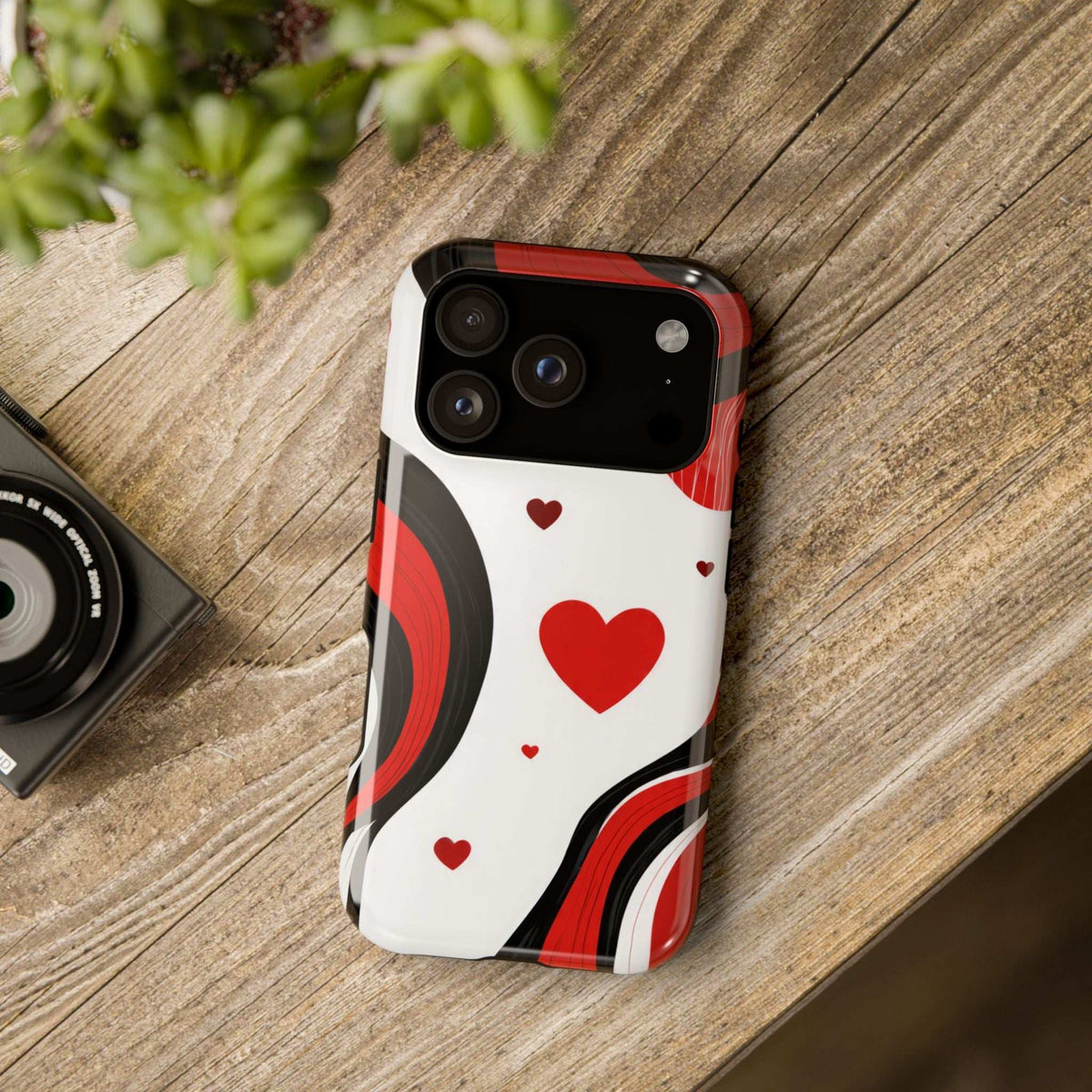 Glossy white phone case with red heart and wave pattern, camera area with cutouts