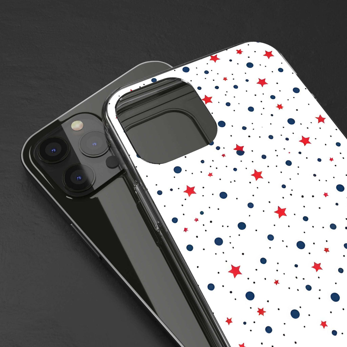 Clear phone case with white star-and-dot pattern in red and blue, camera cutout