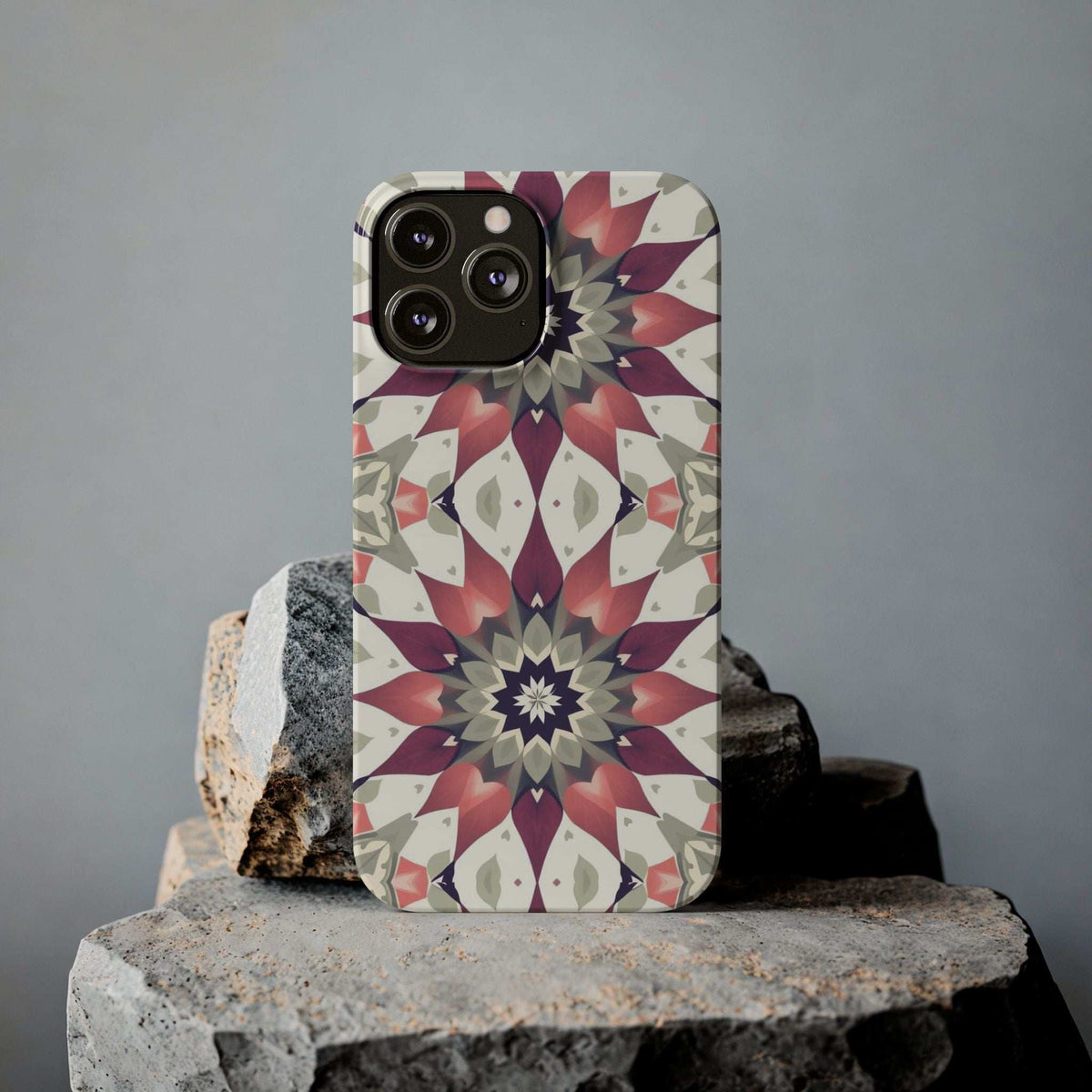 Phone case with burgundy mandala floral design, raised camera protection
