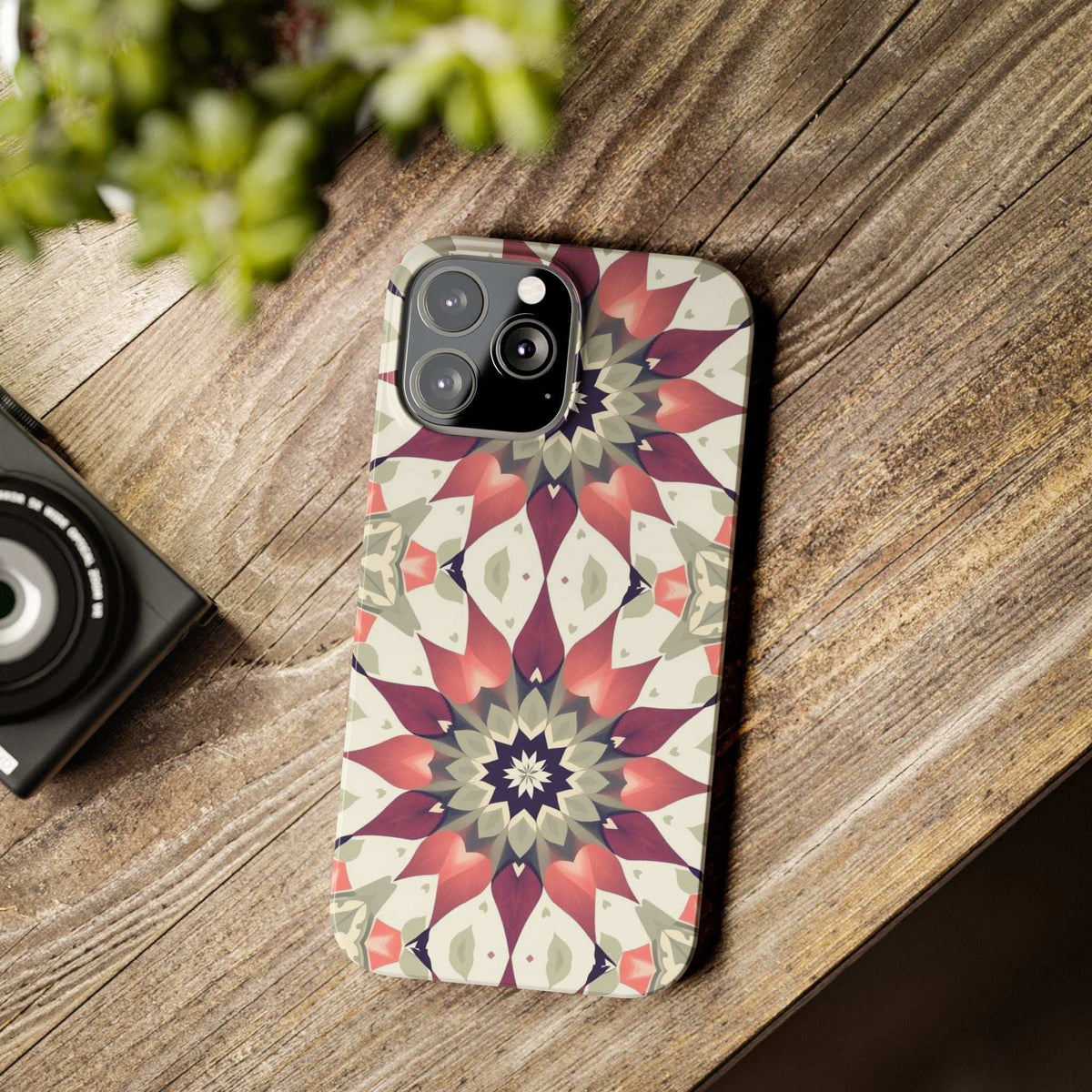 Burgundy mandala phone case with abstract floral pattern and camera cutouts