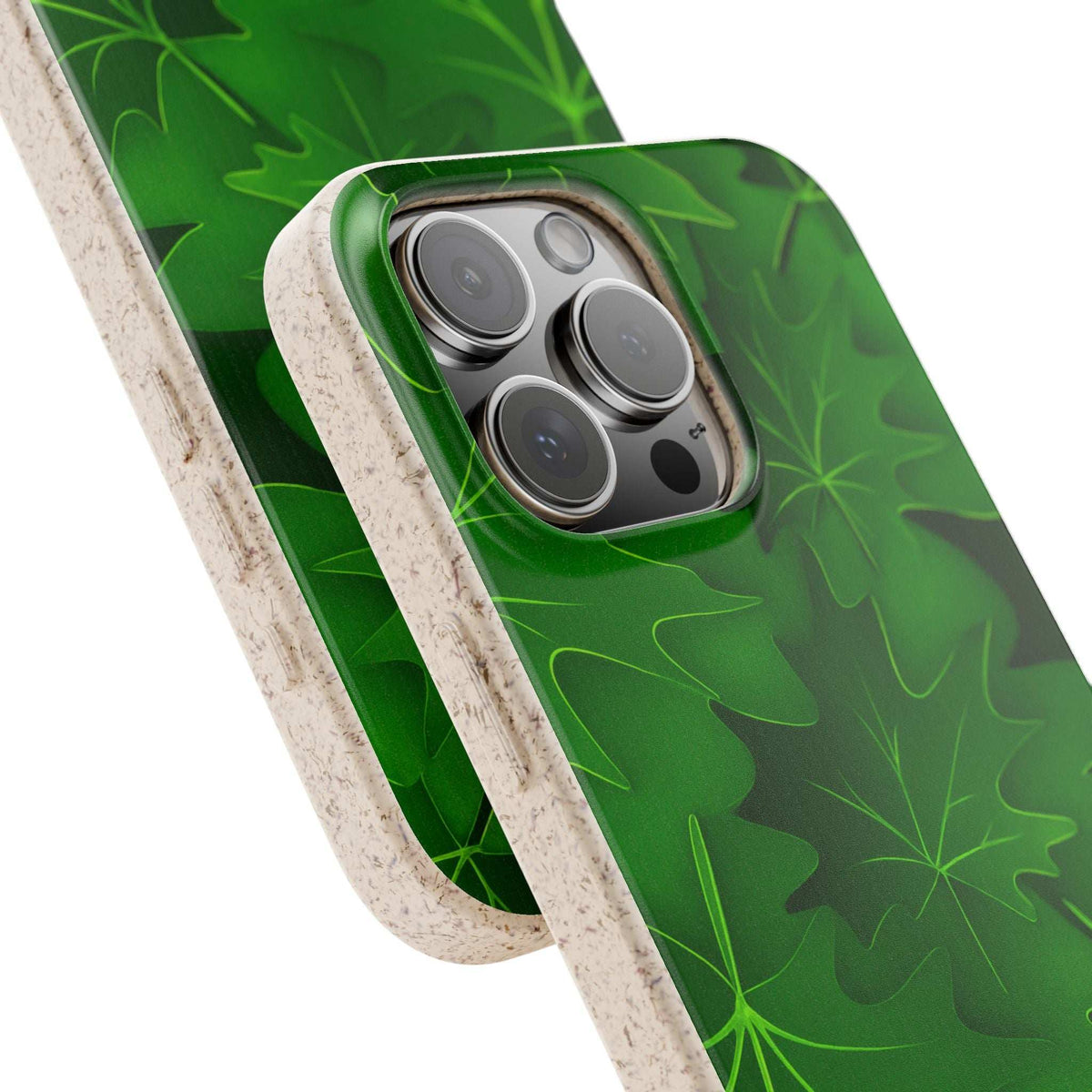 Green leaf-pattern phone case with speckled beige frame; camera lens cutouts