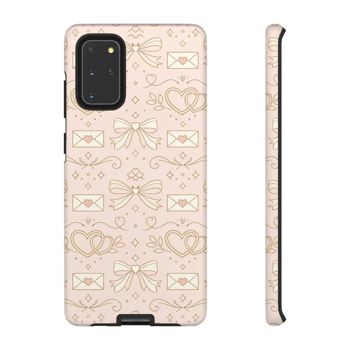 Pink hard phone case with gold heart and envelope pattern; side buttons visible along edge