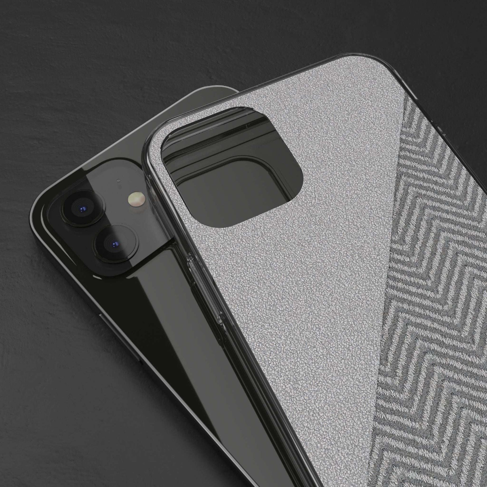 Tough phone case close-up showing raised camera area on speckled gray herringbone pattern