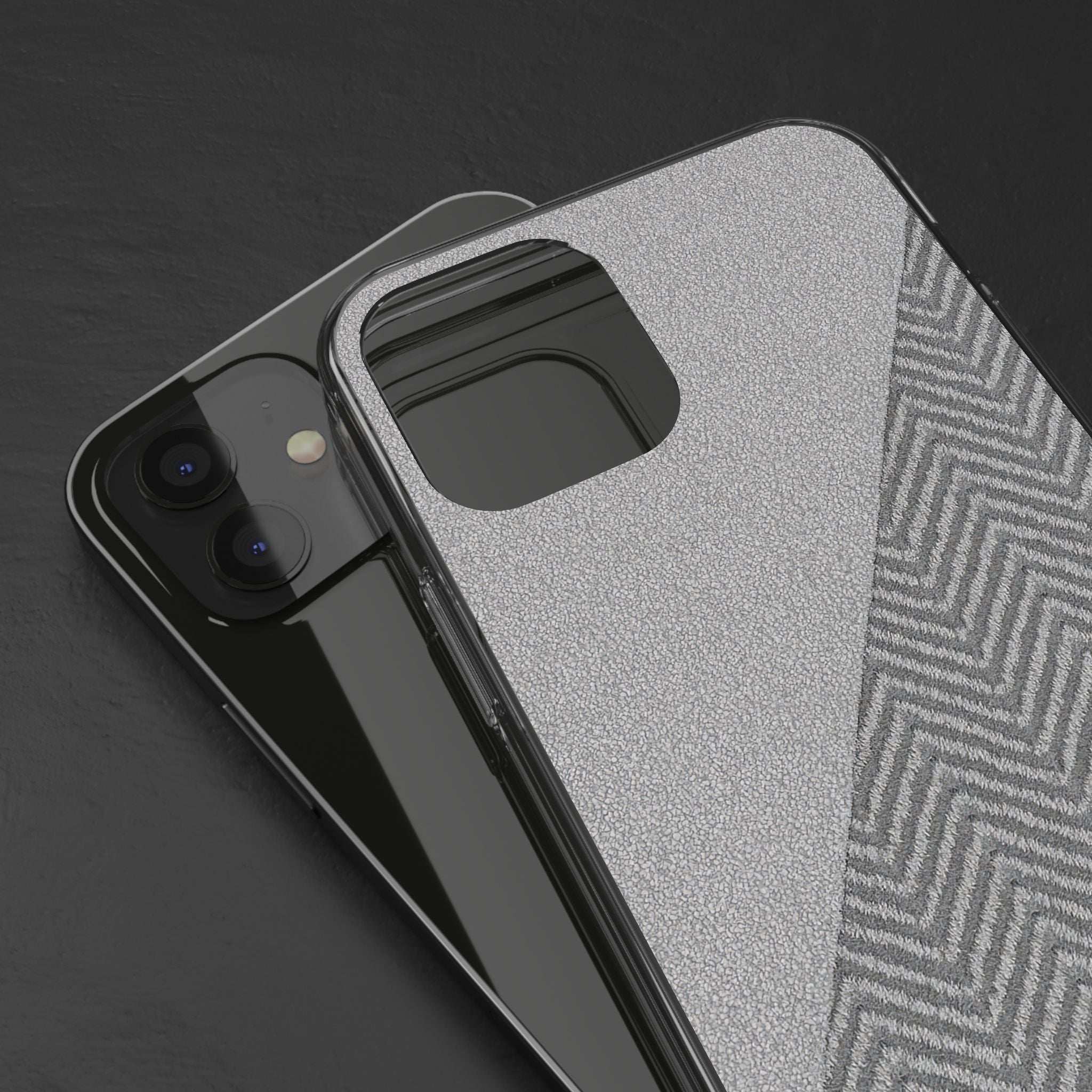 Tough phone case close-up showing raised camera area on speckled gray herringbone pattern