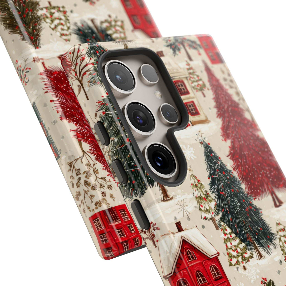 Winter village phone case with red houses and pine trees; angled back with camera lenses.