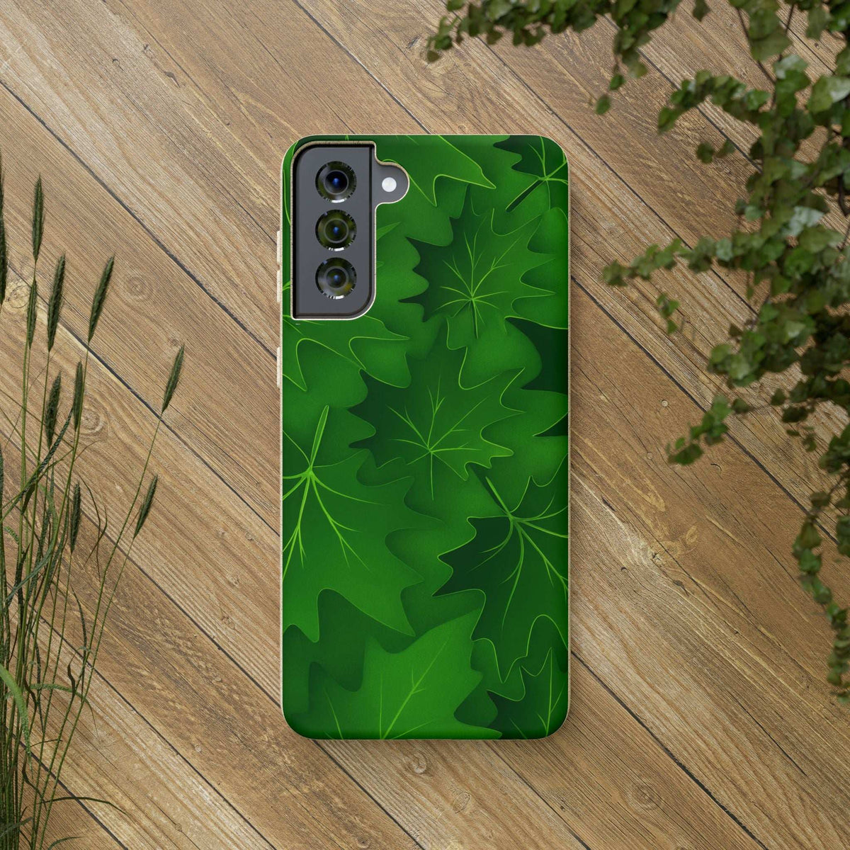 Green botanical leaf phone case with cutouts for triple rear cameras