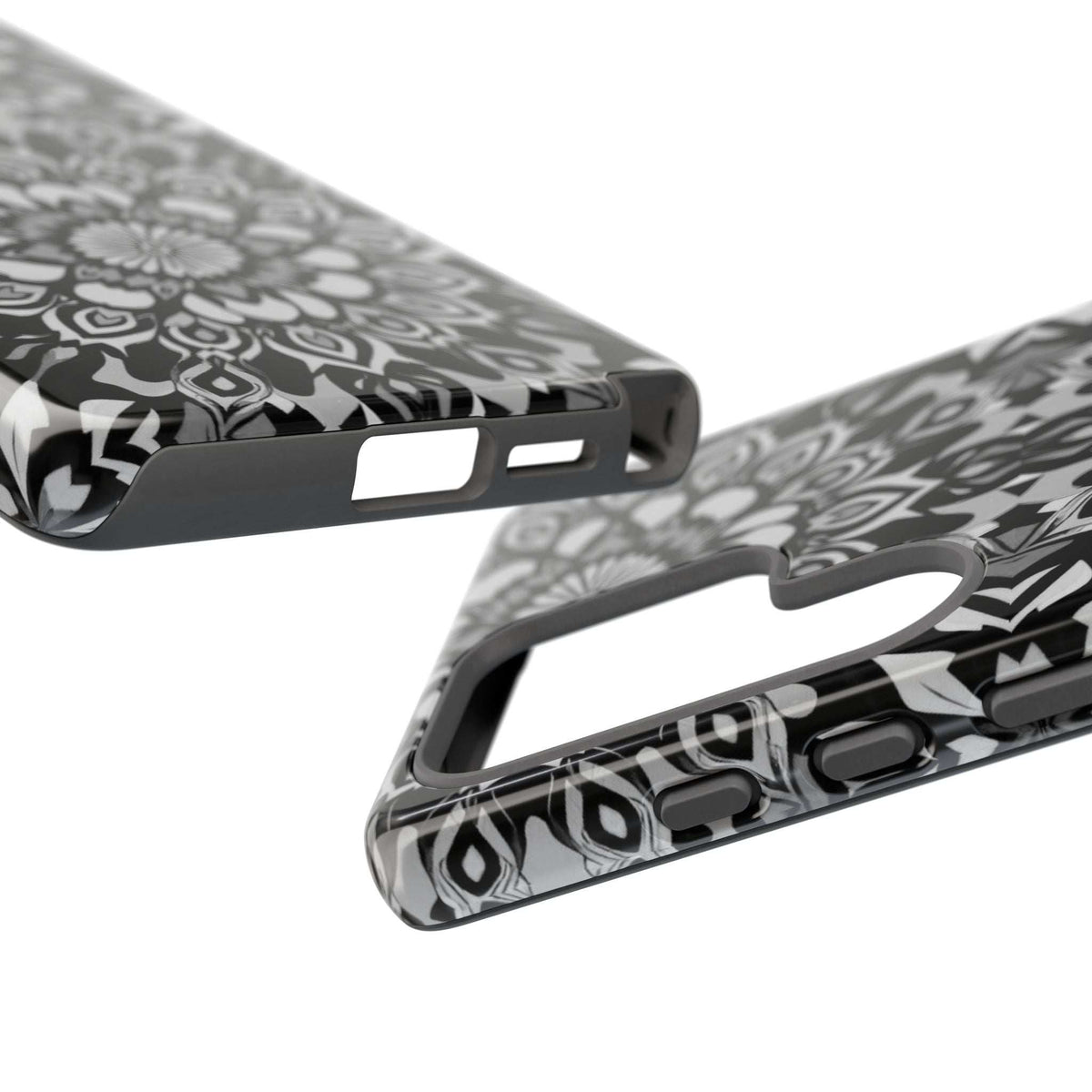 Mandala phone case in black-and-white floral design; side button and port cutouts