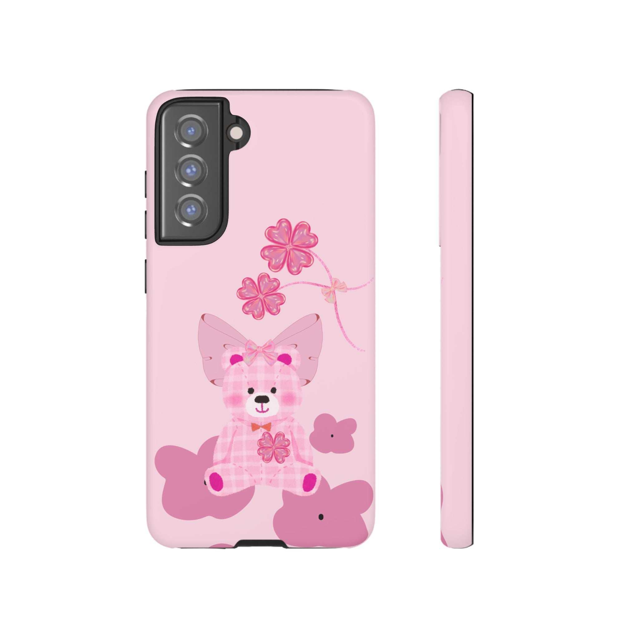 Pink phone case with teddy bear and flower graphic, back view with thin profile