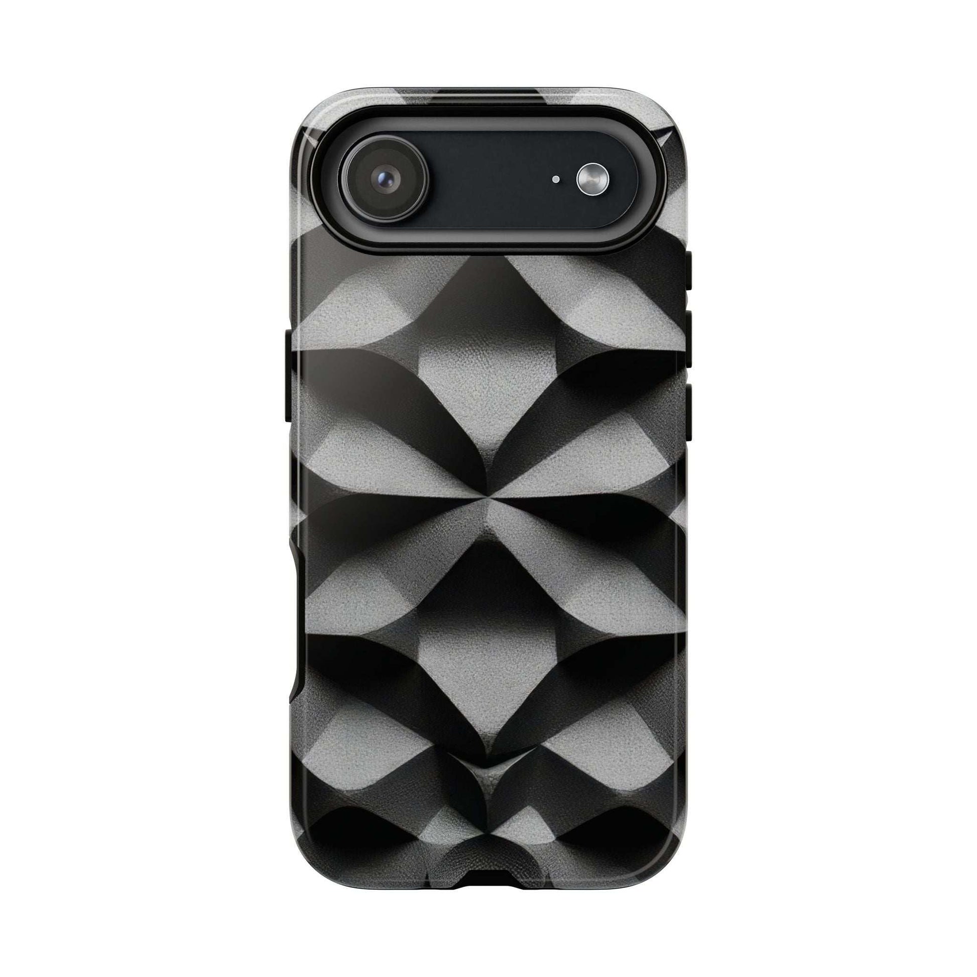 Tough phone case with black back and black-gray geometric design, side button cutouts