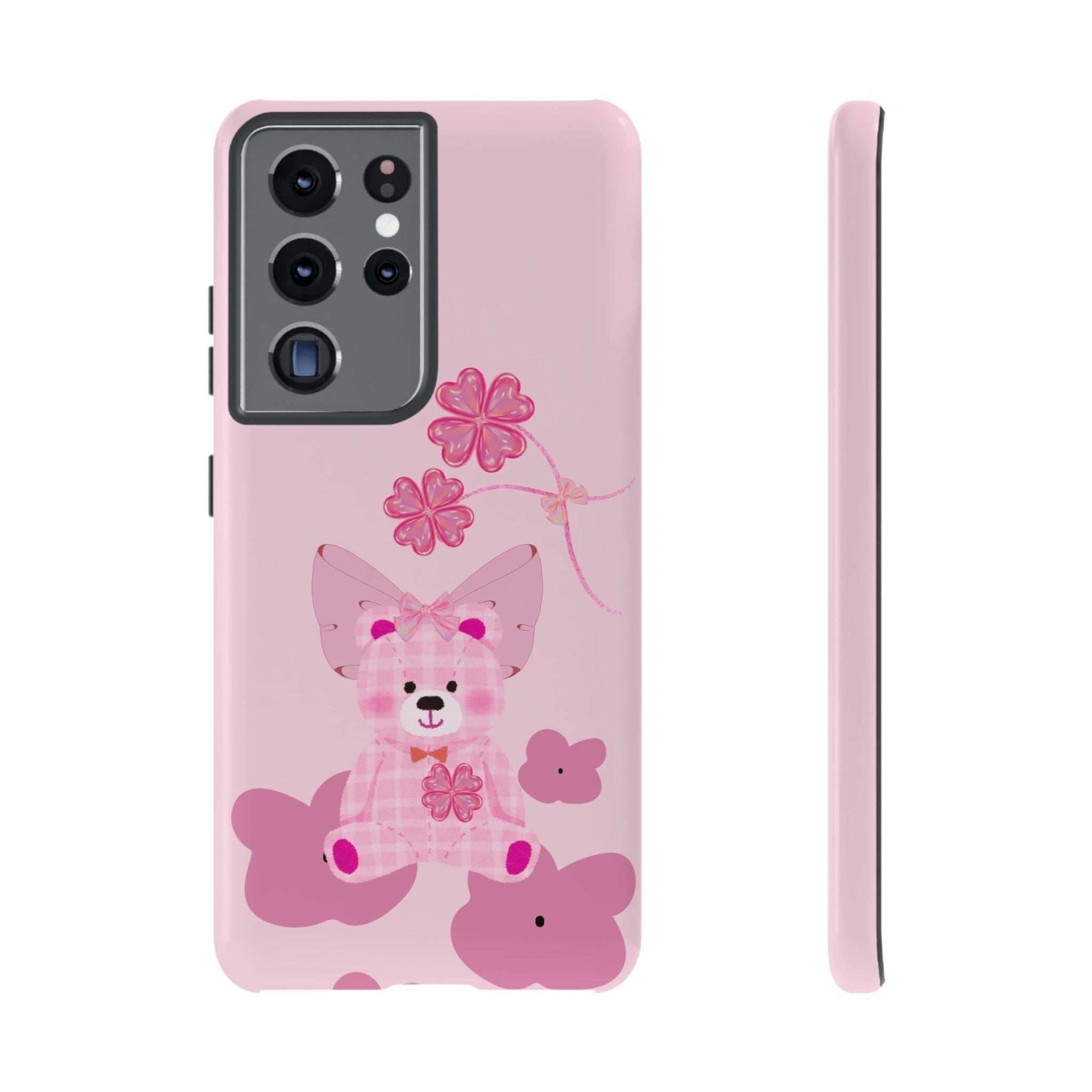 Pink phone case with teddy bear graphic and flowers; triple camera cutout and buttons.