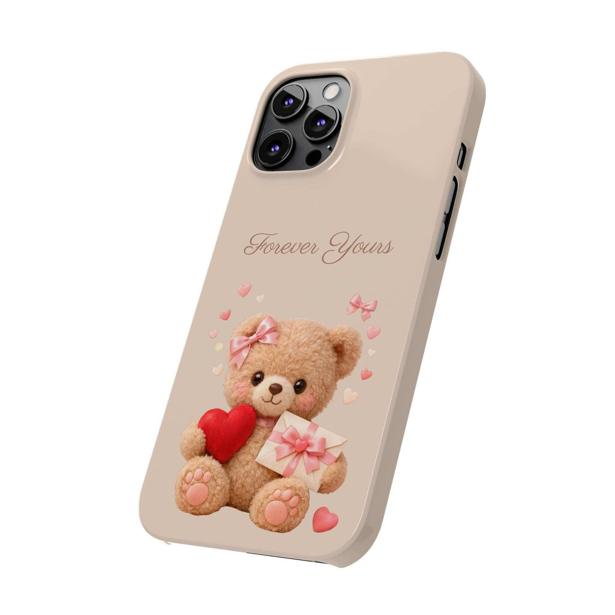 Beige phone case angled view with teddy bear, red heart, gift box, and “Forever Yours”