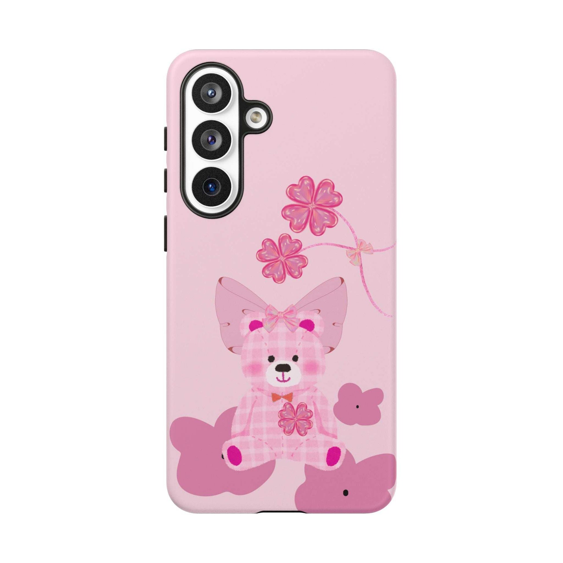 Light pink teddy bear phone case with bow and flower graphics, vertical triple camera