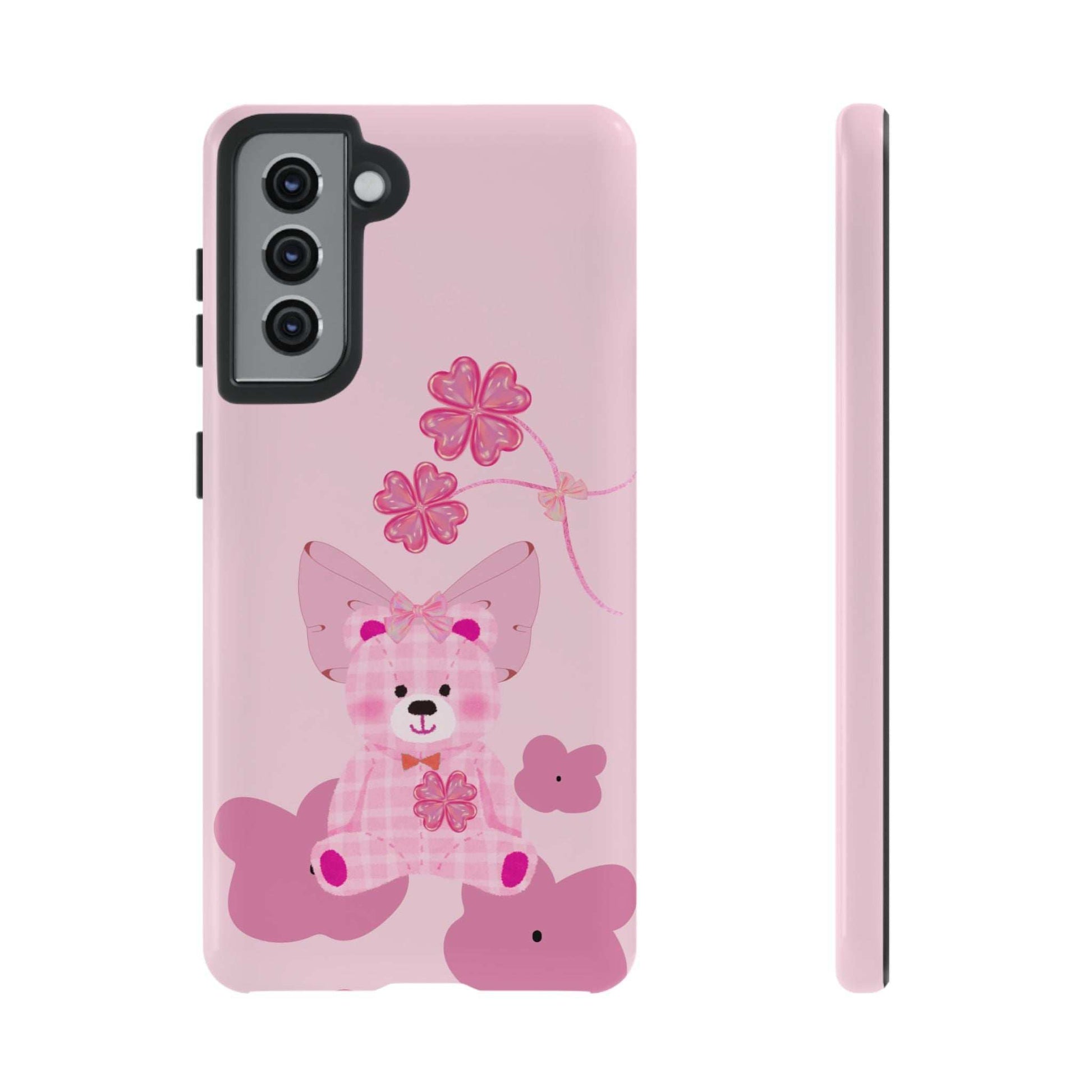 Pink phone case with teddy bear illustration and floral vine; triple camera cutout.