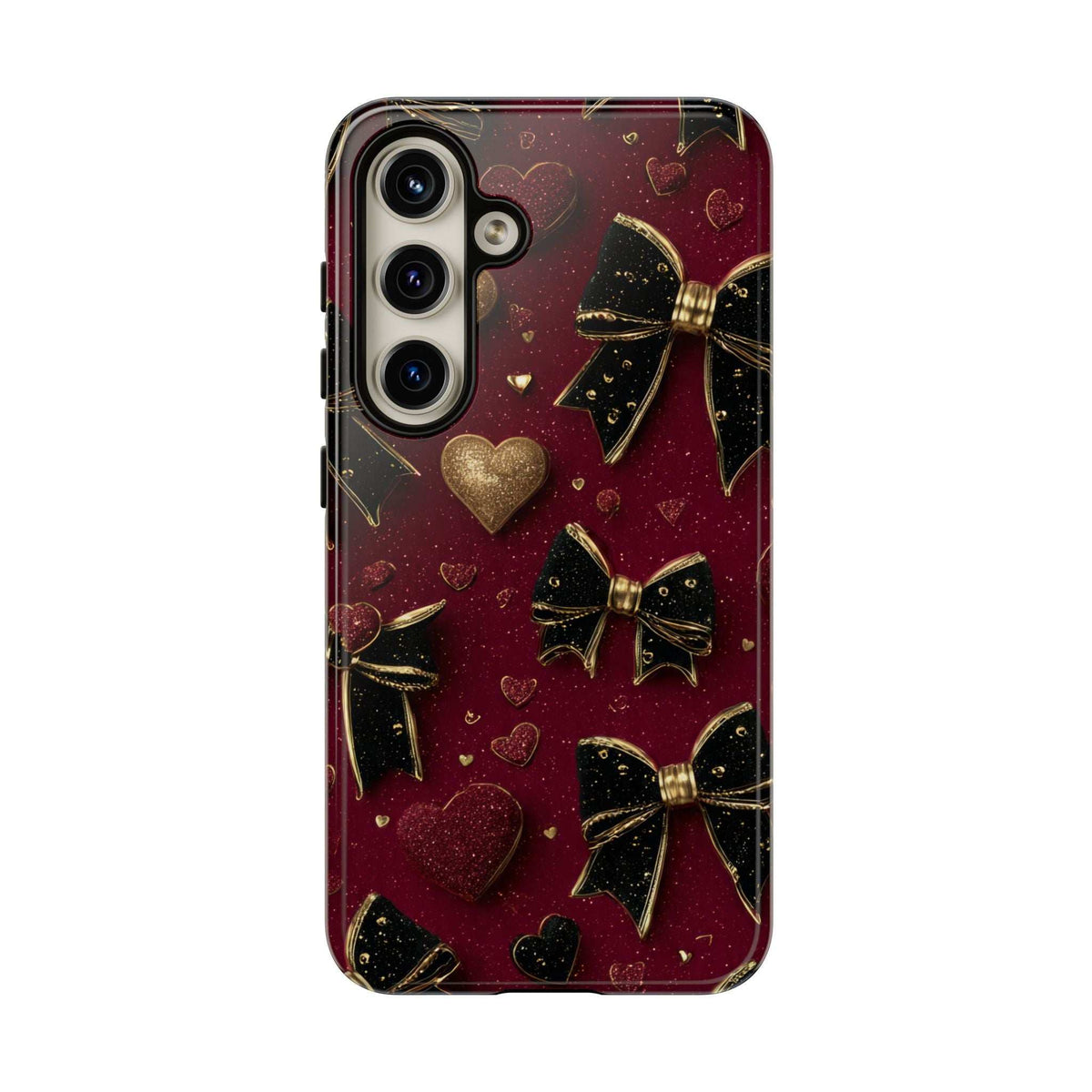Burgundy velvet phone case with gold bow and heart pattern; camera cutouts.