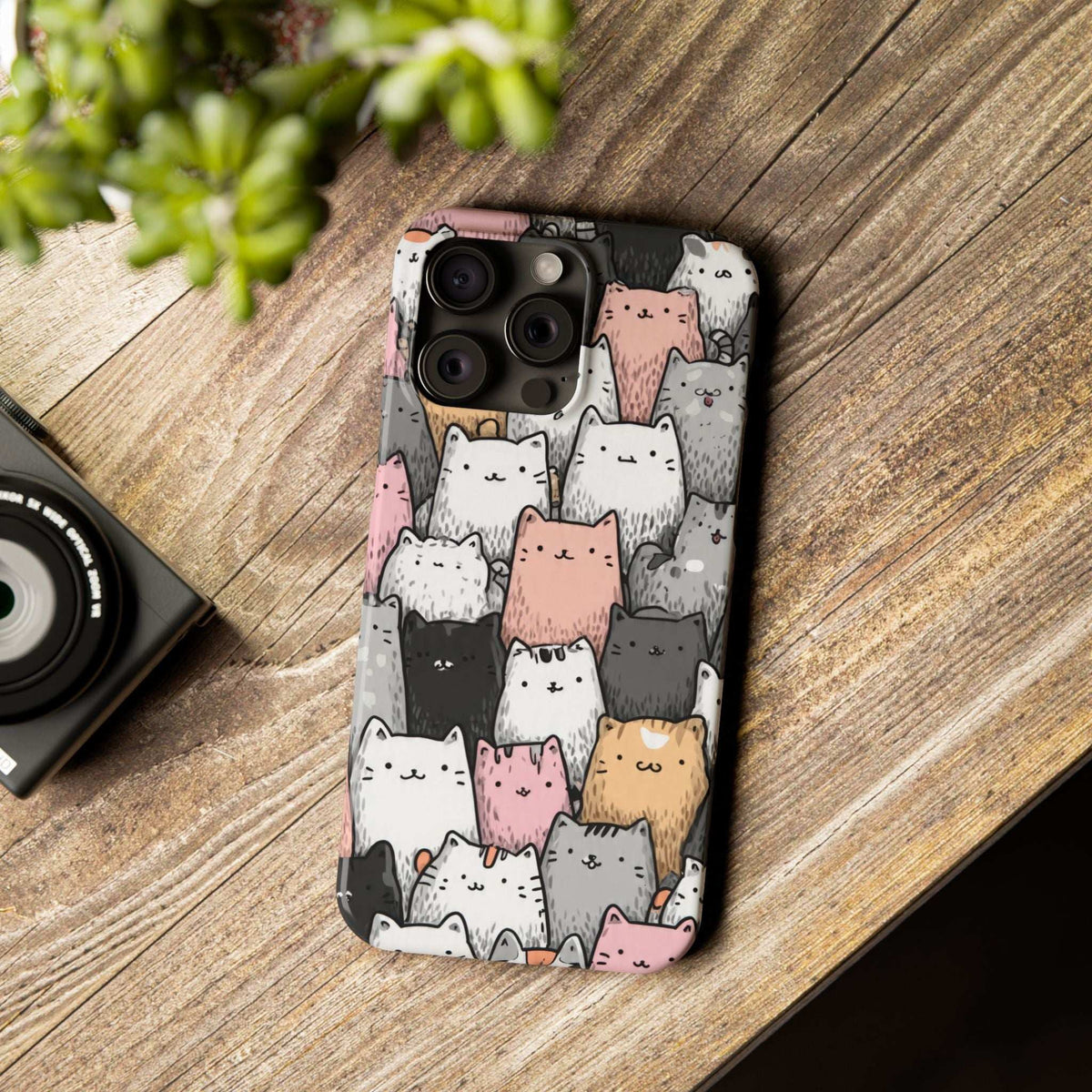 iPhone 11-17 cat patterned phone case on wood surface with pastel cat faces