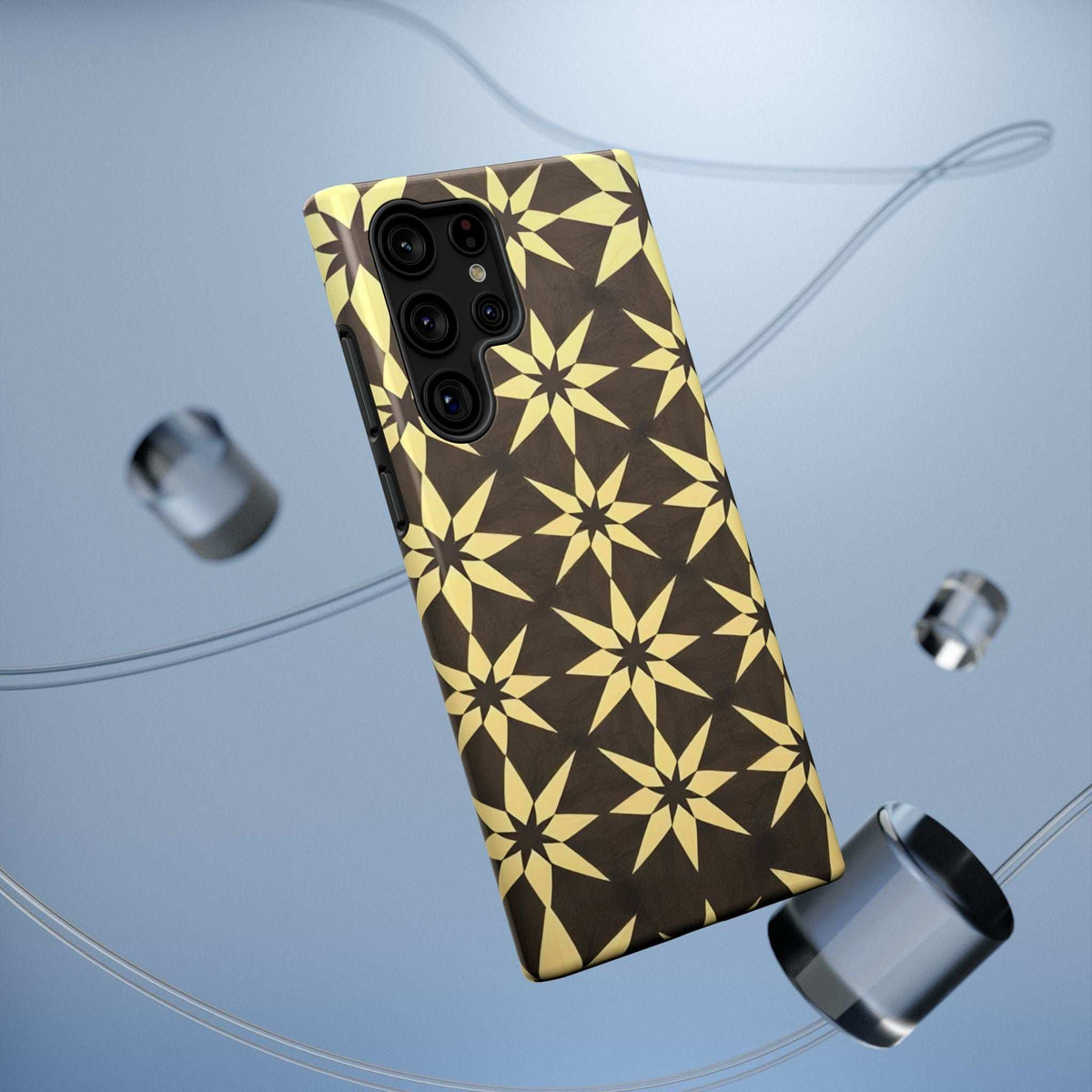 Phone case, dark with gold geometric star pattern; camera module cutouts shown