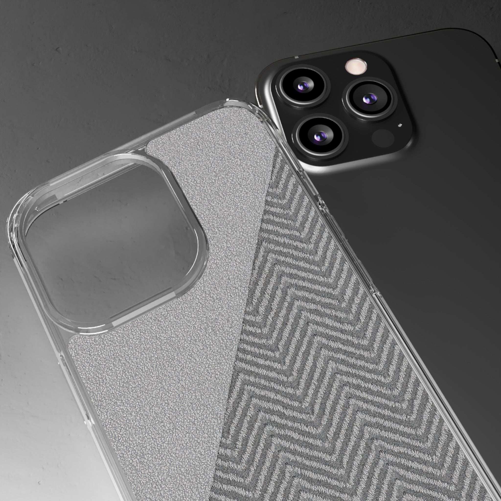 Clear tough phone case with dark herringbone texture and camera lens openings