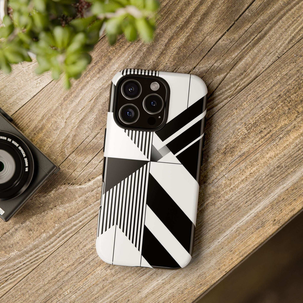 Monochrome tough phone case with black-and-white geometric pattern on the phone back