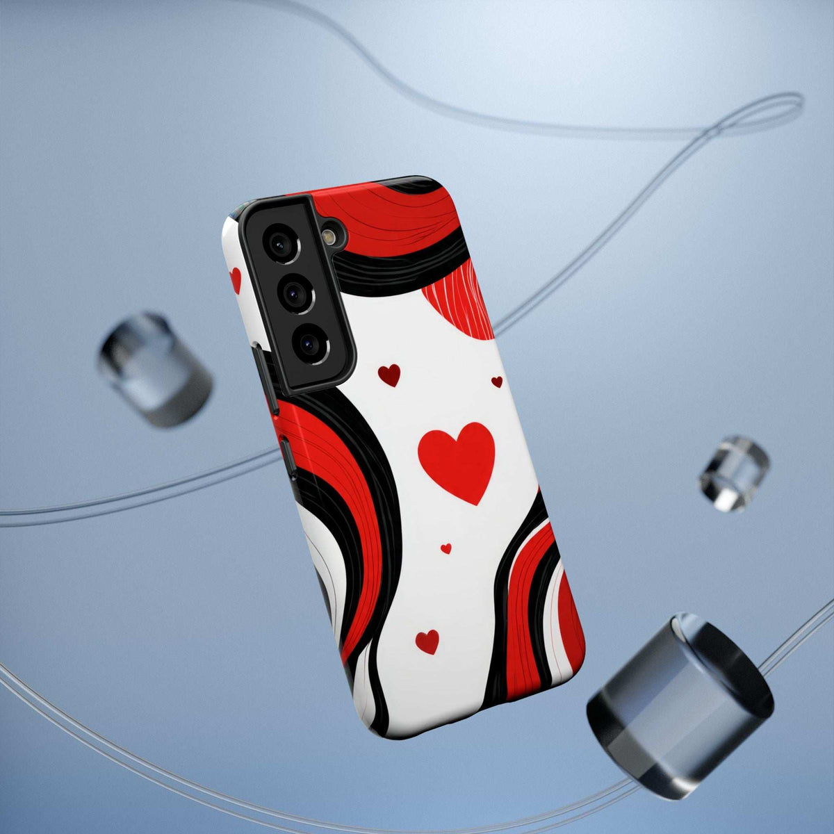 Three-quarter view of red swirl heart phone case with black trim and camera cutouts