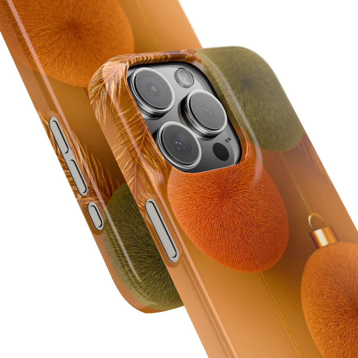 Phone case close-up with orange pom-poms, green fuzzy top, and camera cutout, side button holes