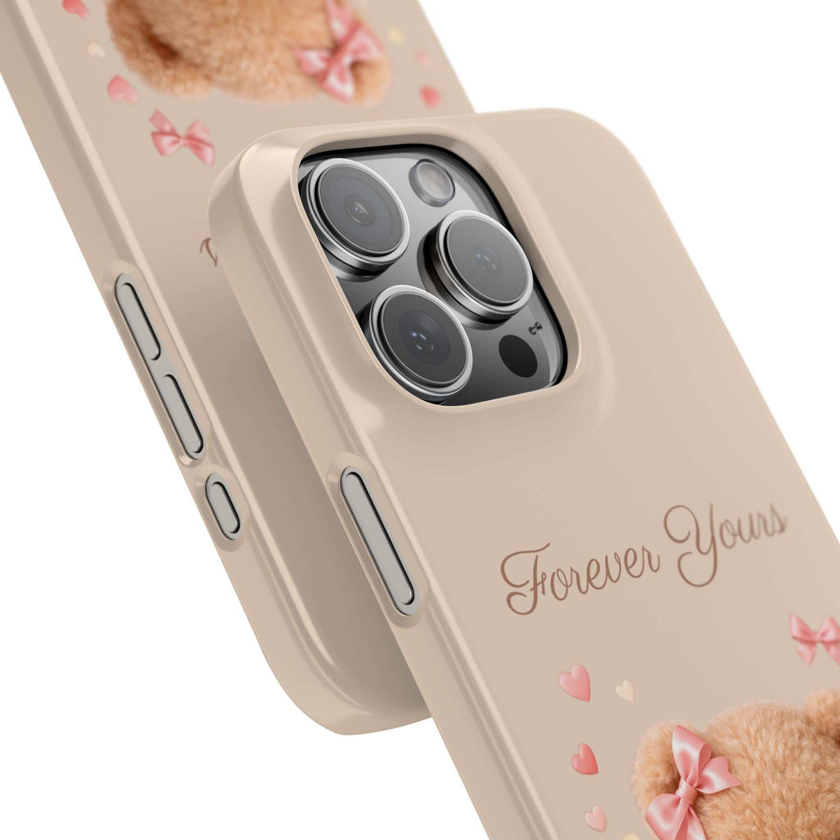 Beige phone case close-up: camera cutouts with teddy bear graphic and “Forever Yours”