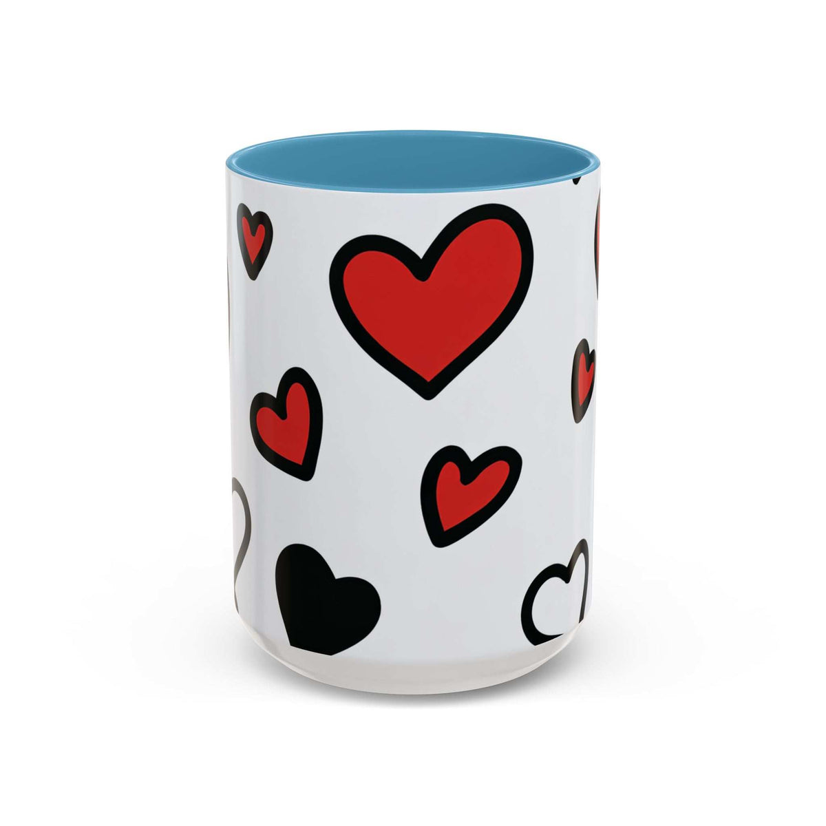 Accent coffee mug with blue interior and rim, white body with red and black heart prints
