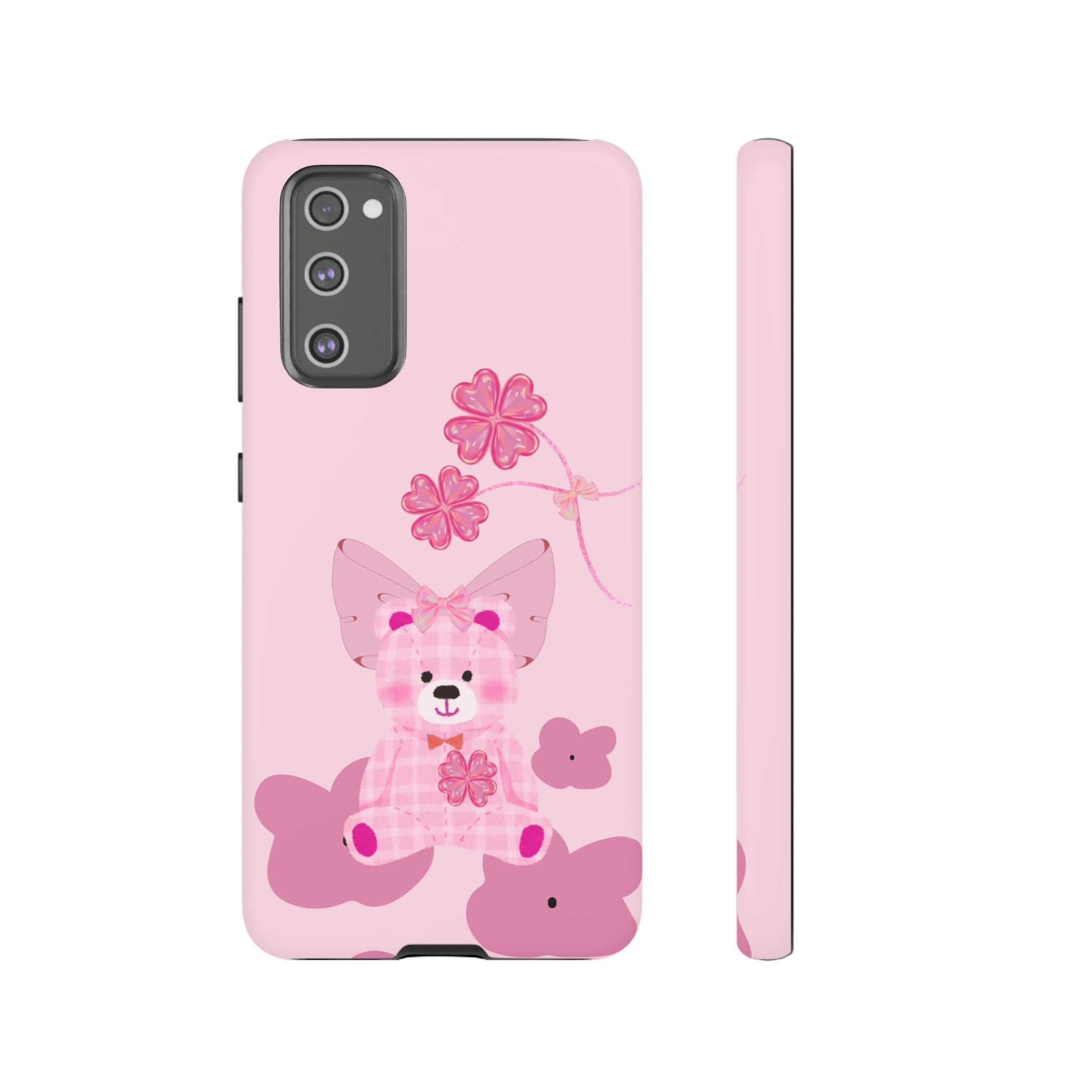 Pink phone case with teddy bear and flower graphic, back view with side buttons