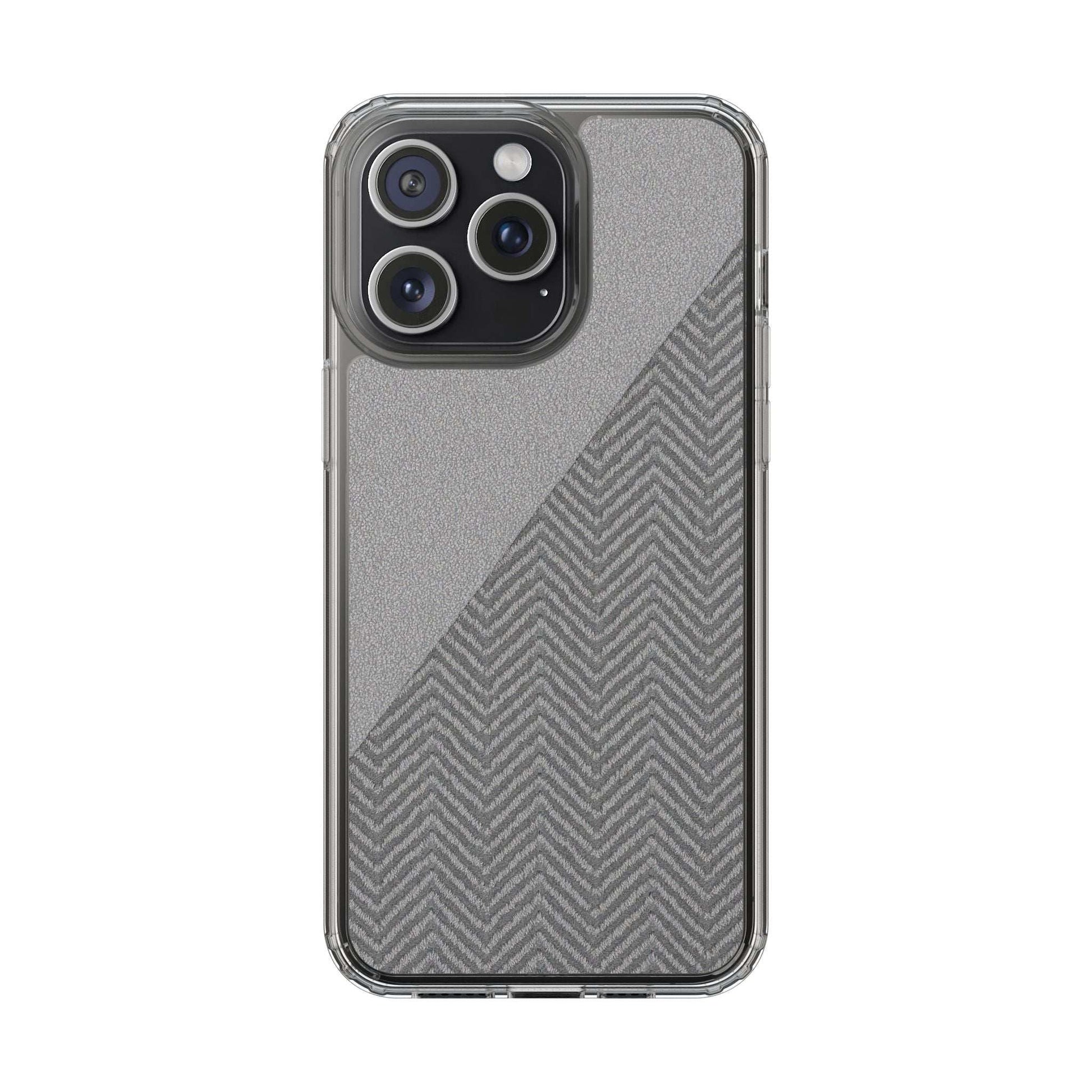 Tough iPhone case with speckled herringbone texture and clear bumper around edges