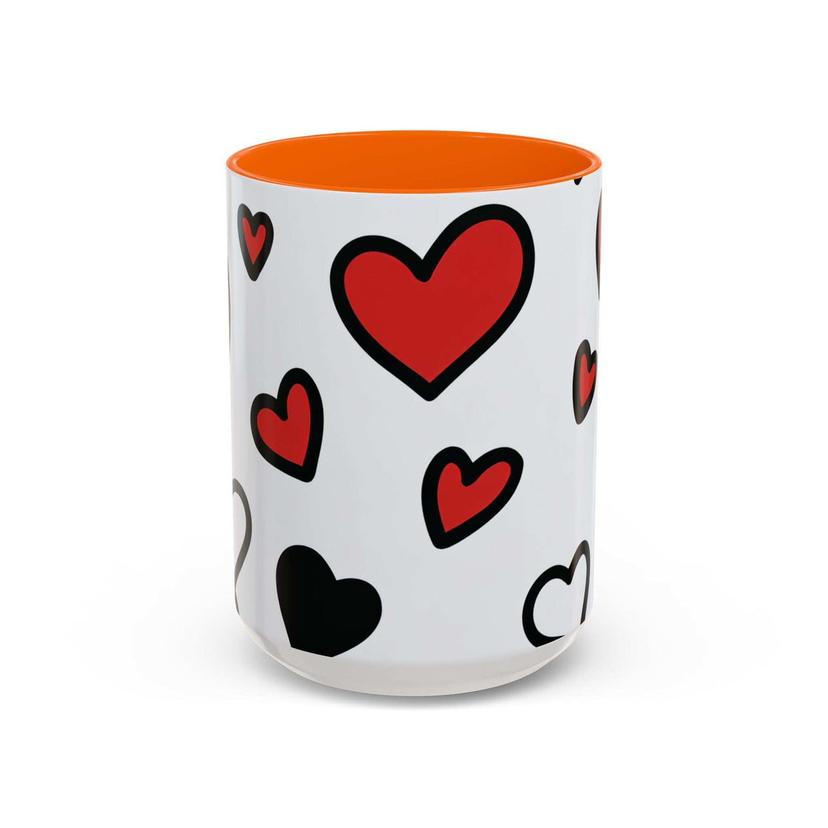 Accent coffee mug with orange interior and rim, white body with red and black heart prints
