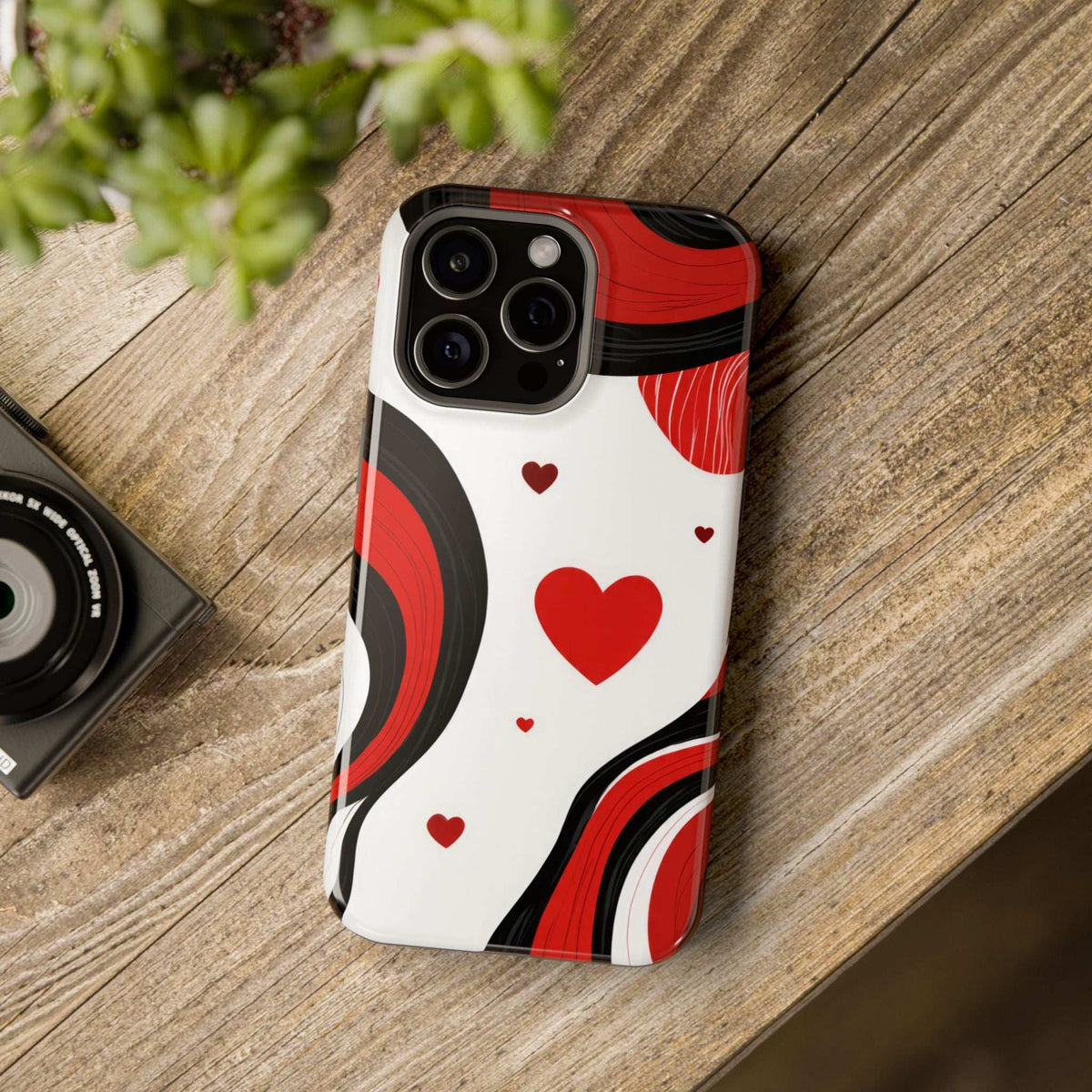 Glossy heart-themed phone case with red waves and hearts on white, device shown
