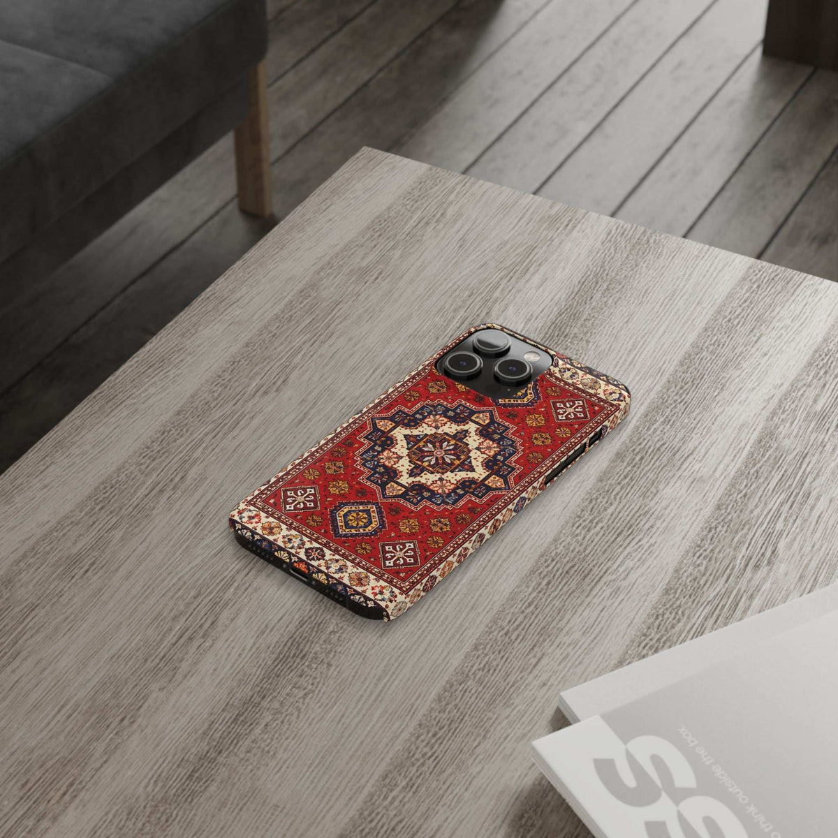 Armenian carpet pattern phone case on wood floor, red and blue medallion design