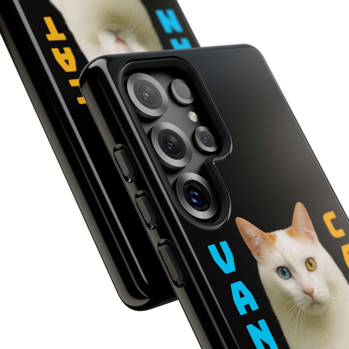Black phone case close-up showing camera lens cutouts and cream cat graphic