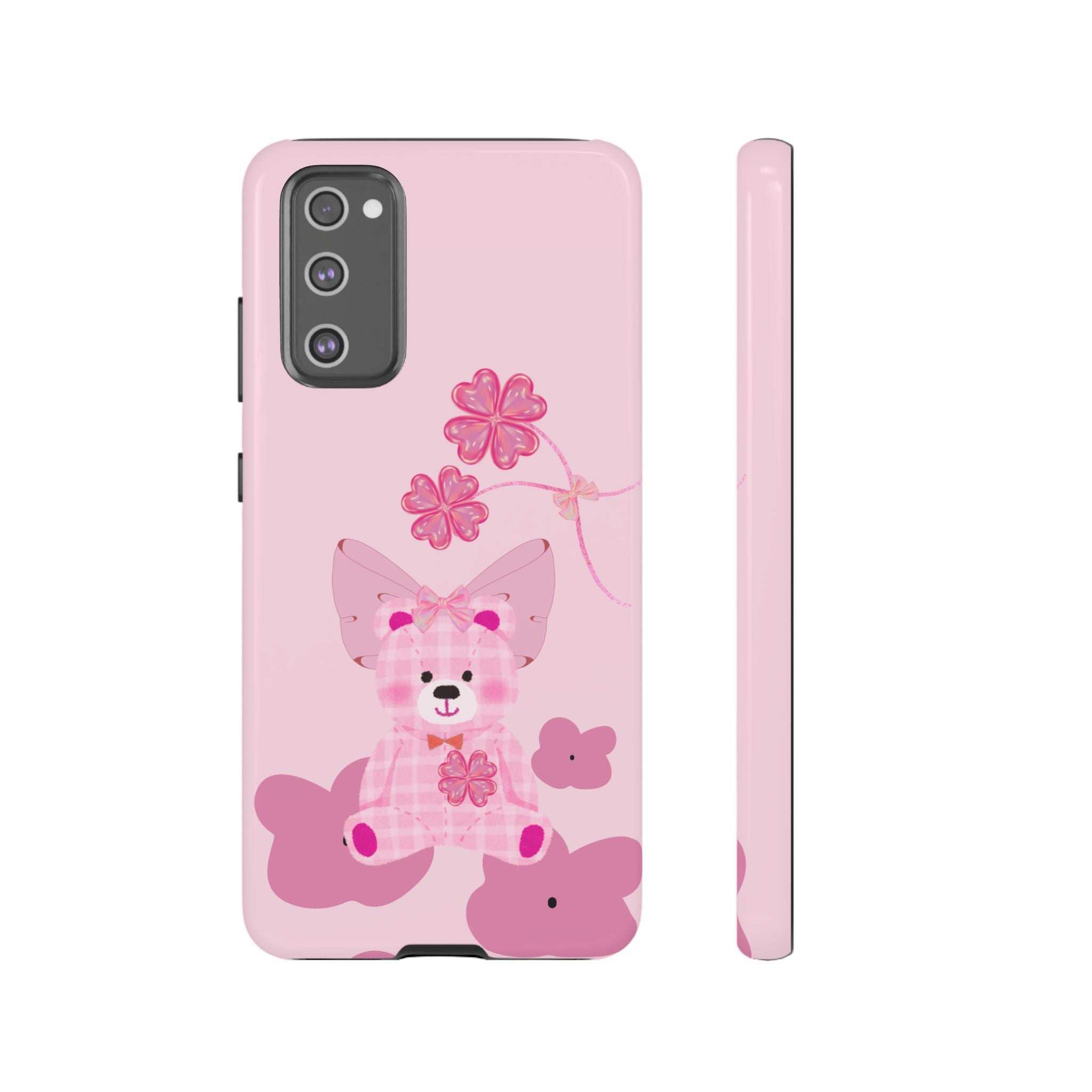 Pink phone case with teddy bear and flower graphic, back and side edge shown