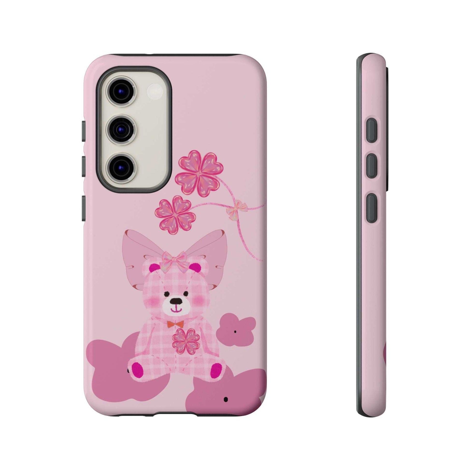 Pink phone case with teddy bear and flower graphic, back and side with port cutouts