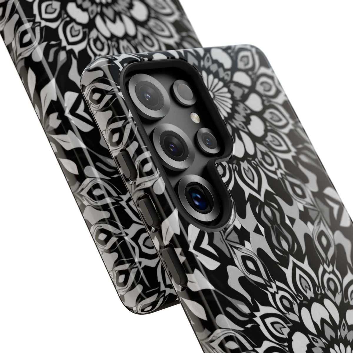 Mandala phone case with black-and-white floral pattern; camera lens openings visible